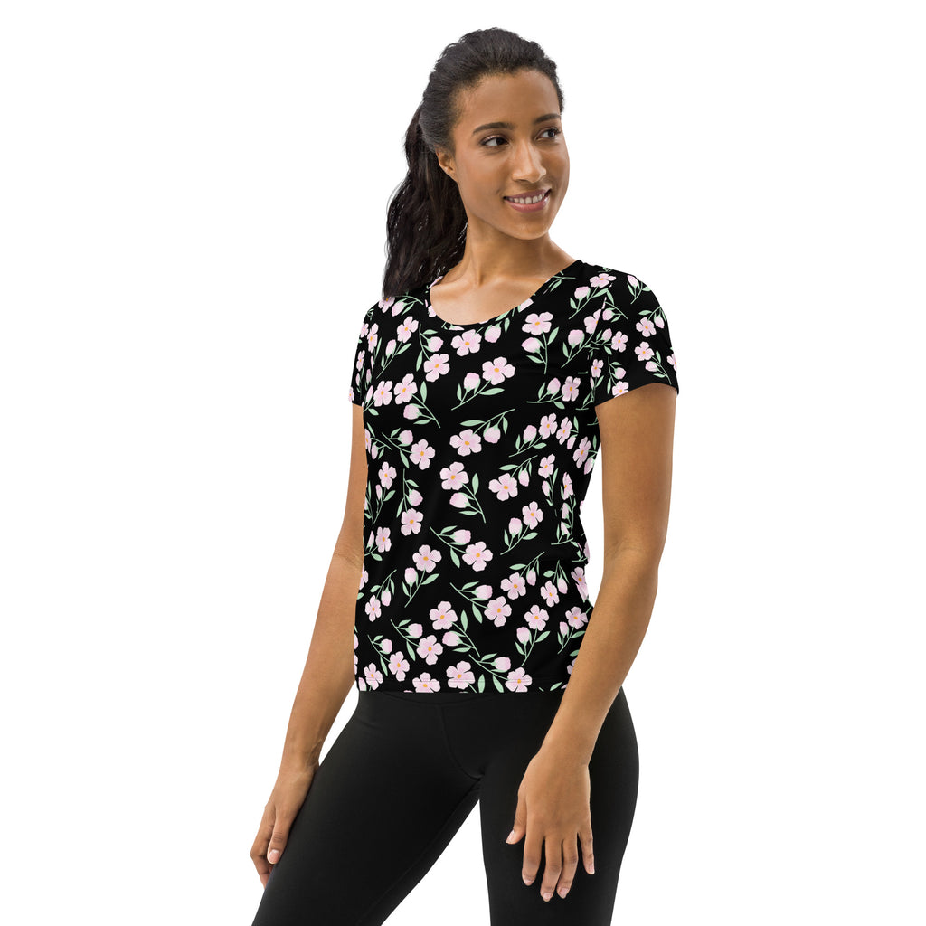 Women’s black floral performance athletic t-shirt with delicate pink pattern lightweight moisture wicking upf 50+