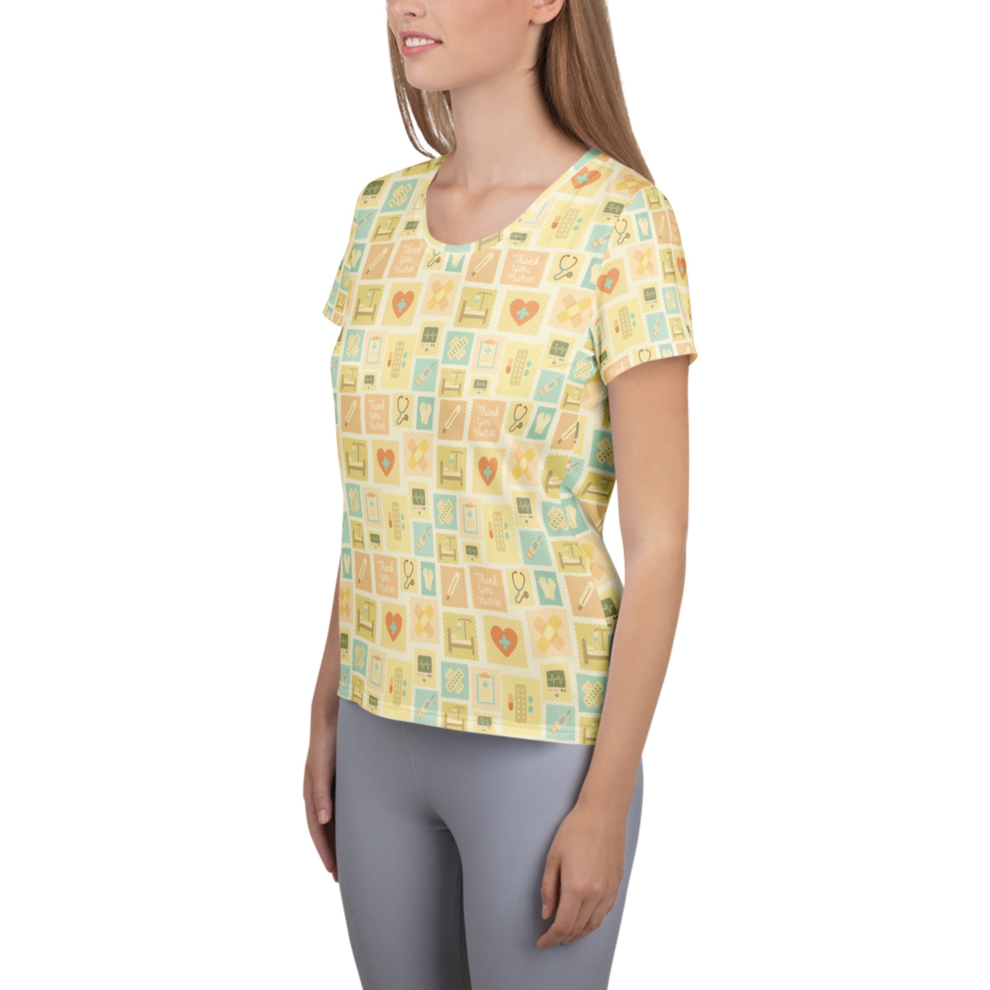 Women’s yellow nurse icon performance athletic t-shirt with soft yellow fabric and pastel medical icons pattern