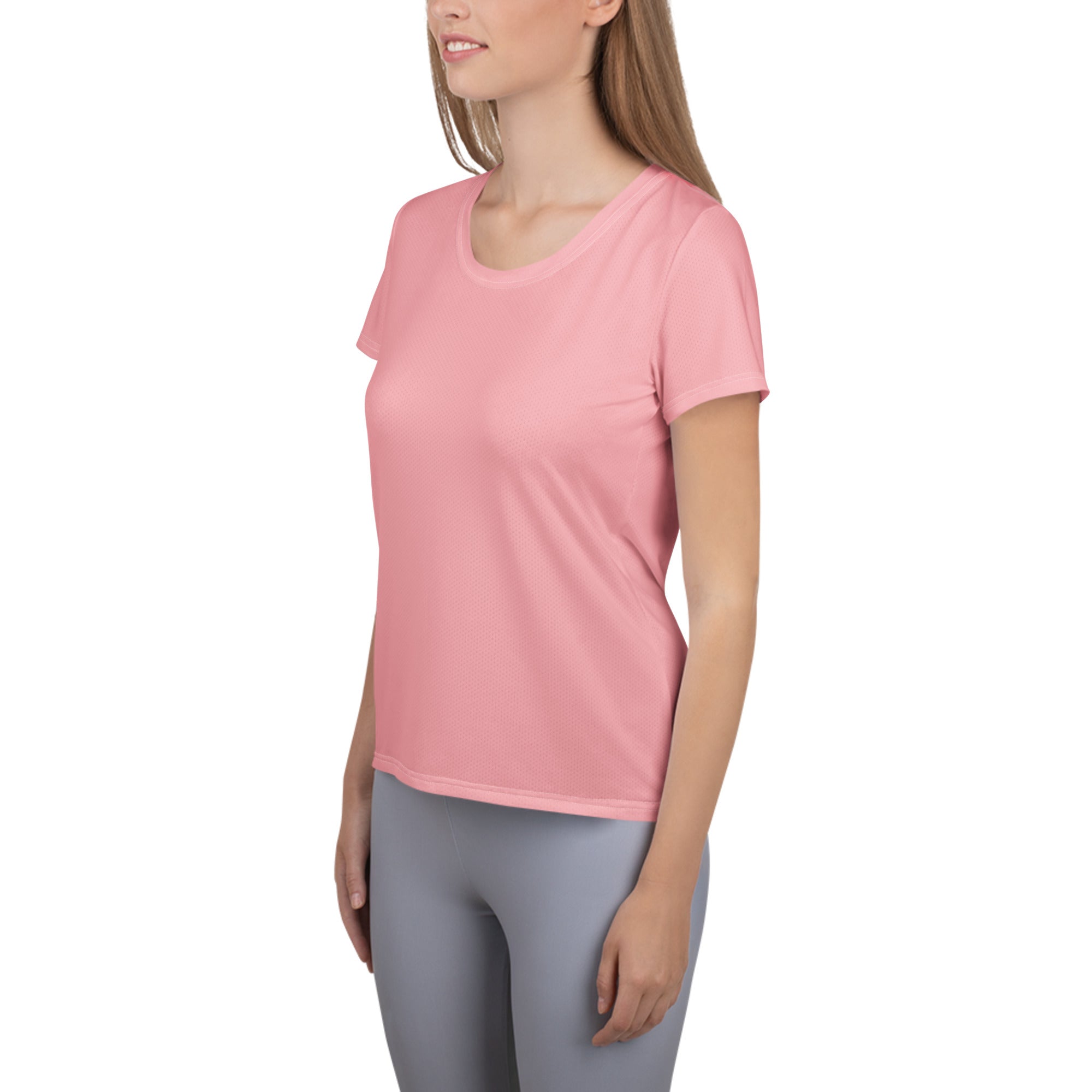 A soft pink women’s short-sleeved athletic t-shirt with rounded neckline lightweight moisture wicking fabric and upf 50+