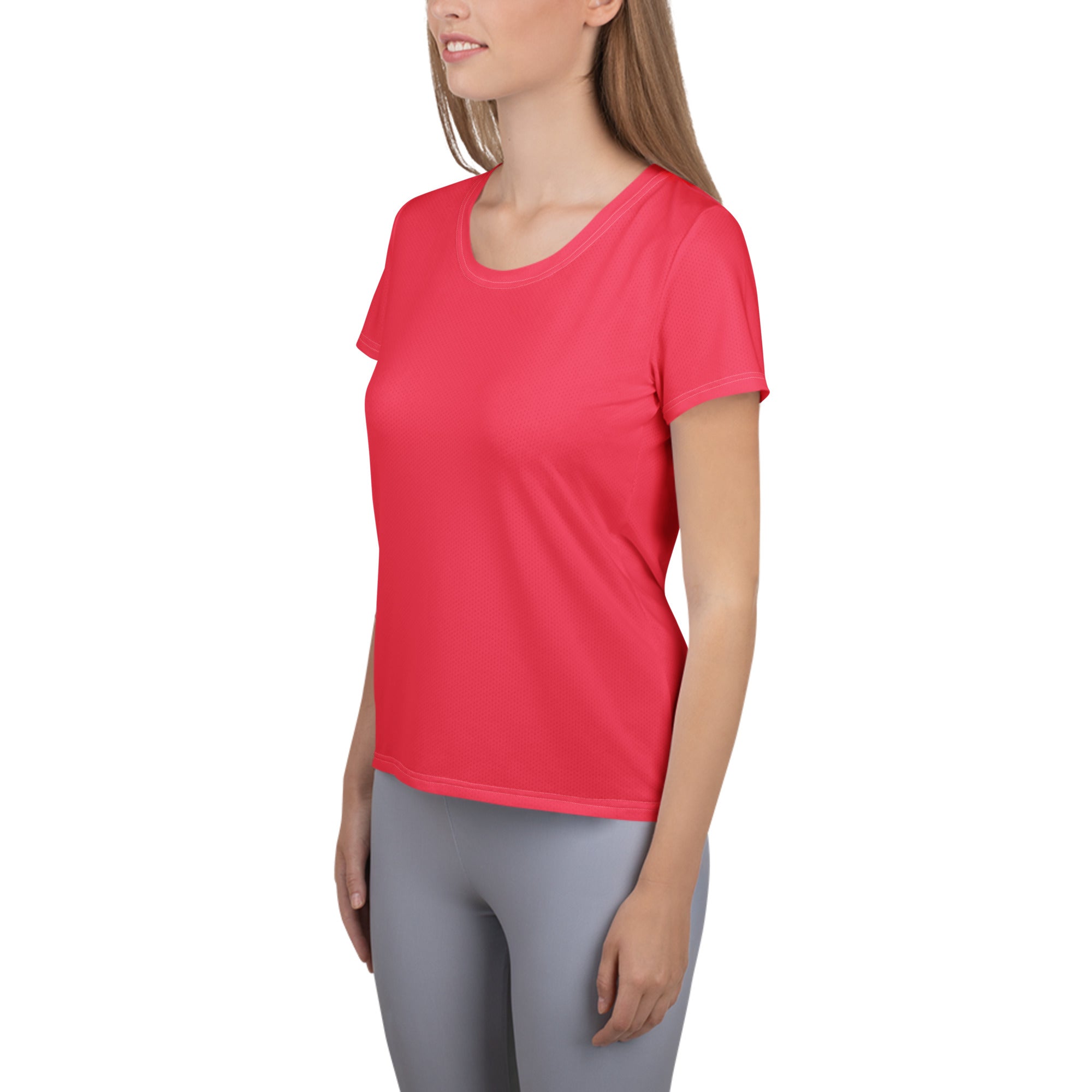 A vibrant coral pink short-sleeved performance t-shirt with soft smooth fabric and rounded neckline for workouts