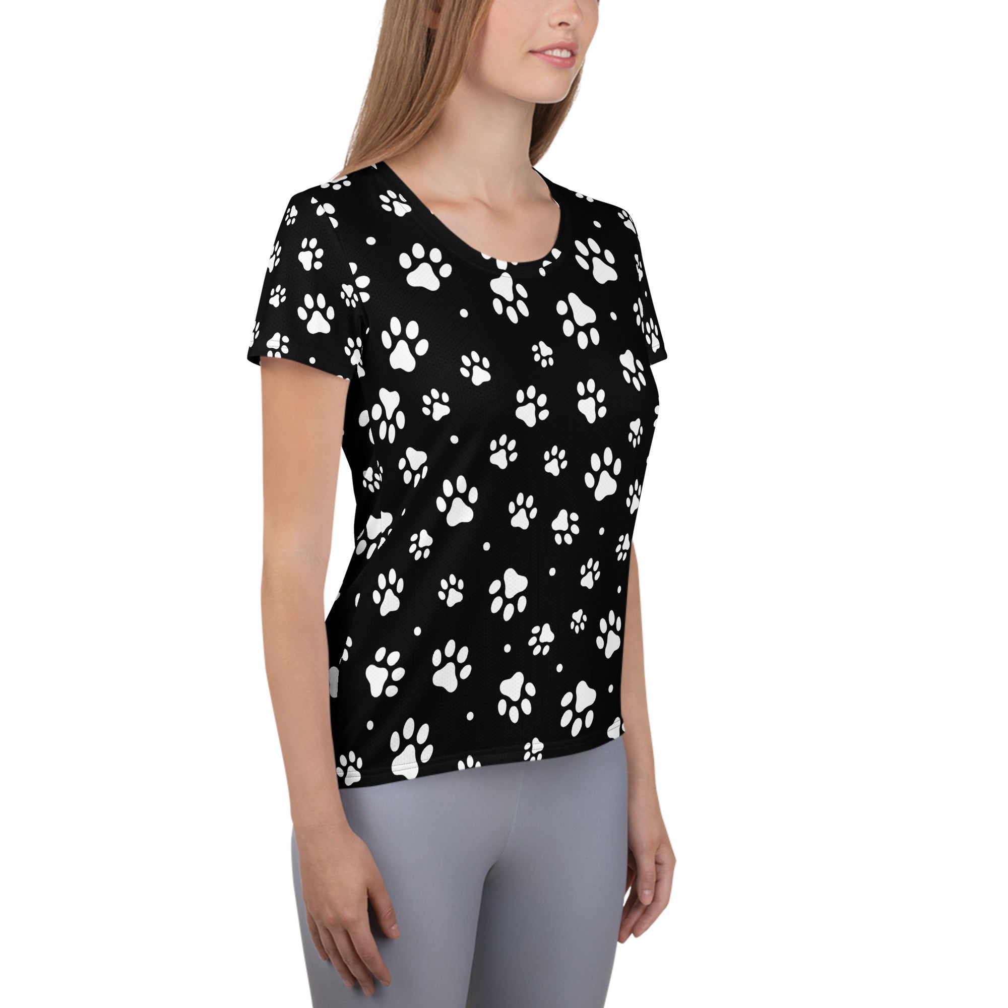 Black short-sleeved performance athletic t-shirt with white paw print pattern lightweight moisture wicking upf 50+