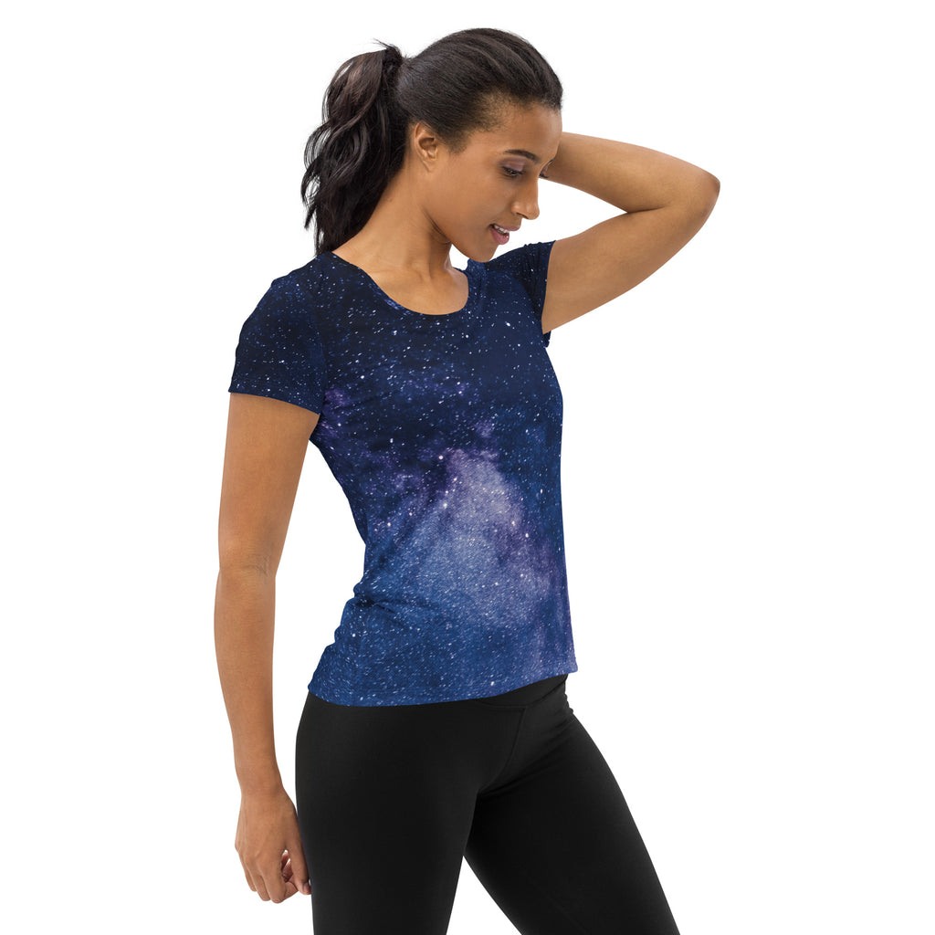 A navy blue women’s short-sleeved galaxy print performance t-shirt with lightweight moisture wicking fabric and UPF 50+