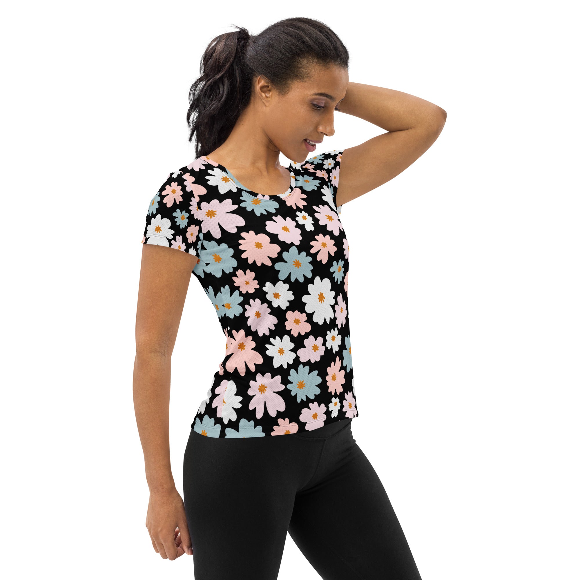 Women’s black short-sleeved retro floral performance athletic t-shirt with vibrant pink blue white blossoms and upf 50+