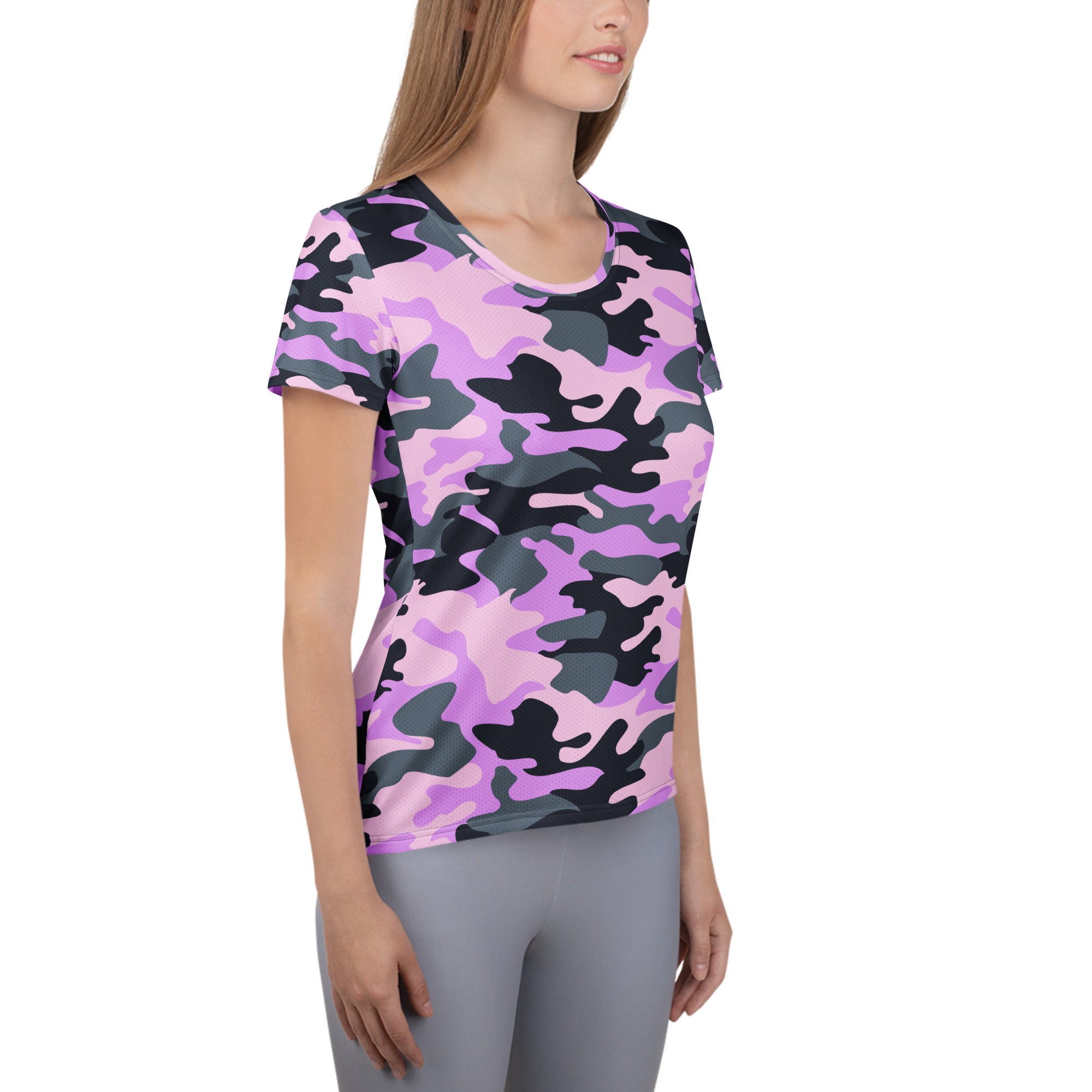 Women’s purple short-sleeved camouflage performance t-shirt with vibrant pink and black pattern and moisture-wicking fabric