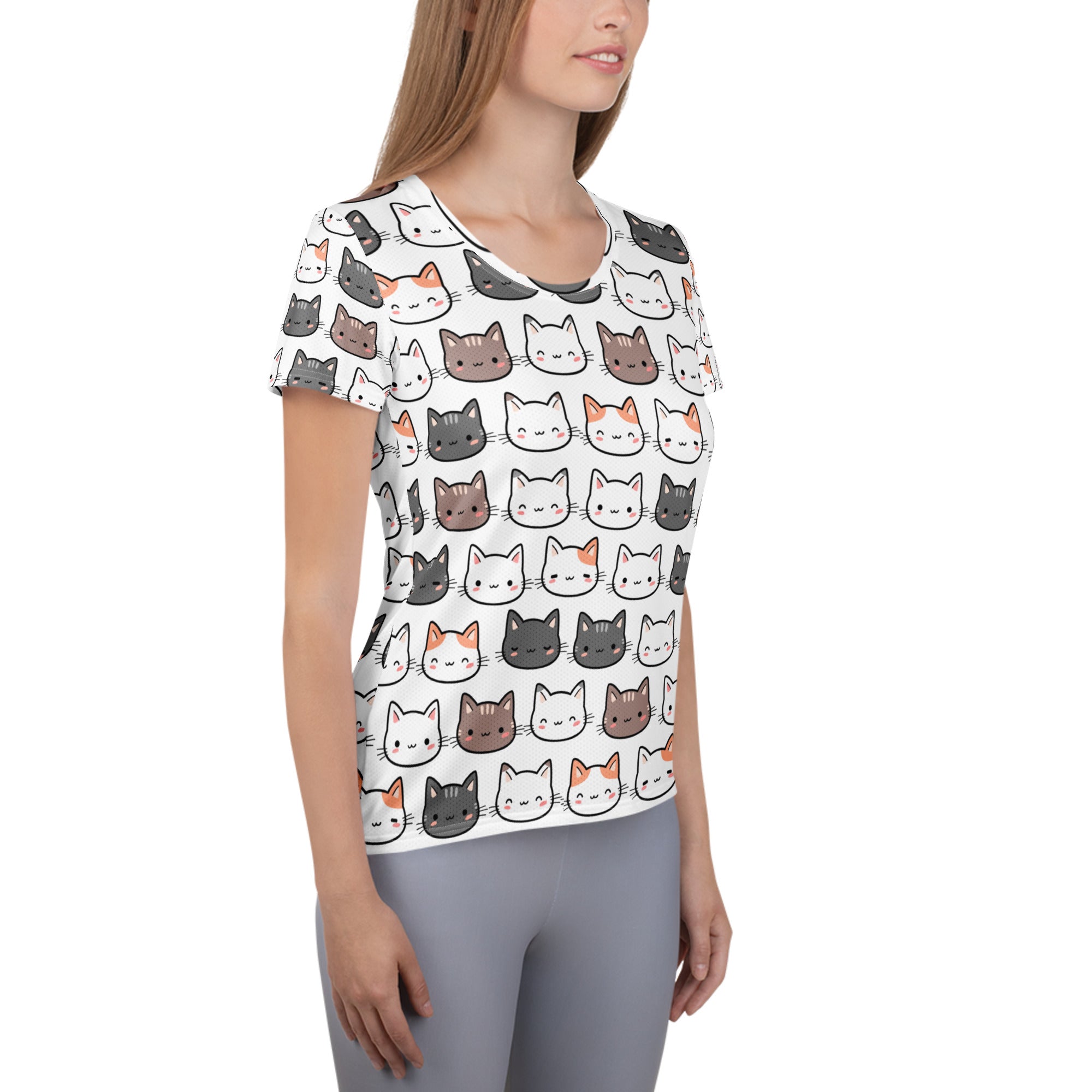 Women’s white short-sleeved lightweight moisture-wicking athletic t-shirt with colorful cartoon cat faces and UPF 50 plus protection