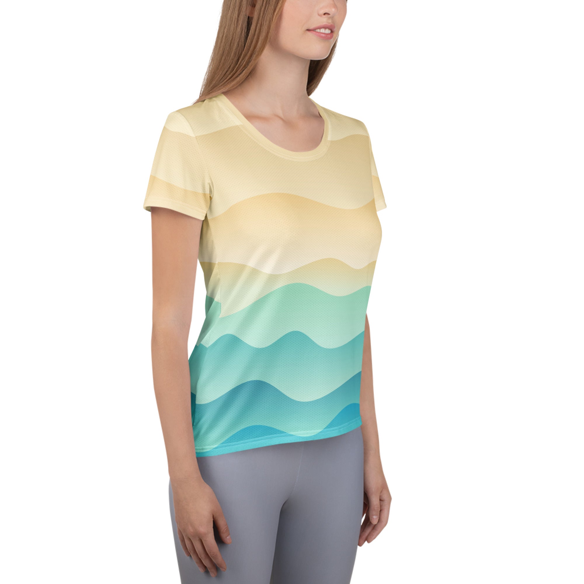 Women’s short-sleeved performance athletic t-shirt with yellow to teal wave gradient, lightweight moisture wicking fabric, UPF 50+