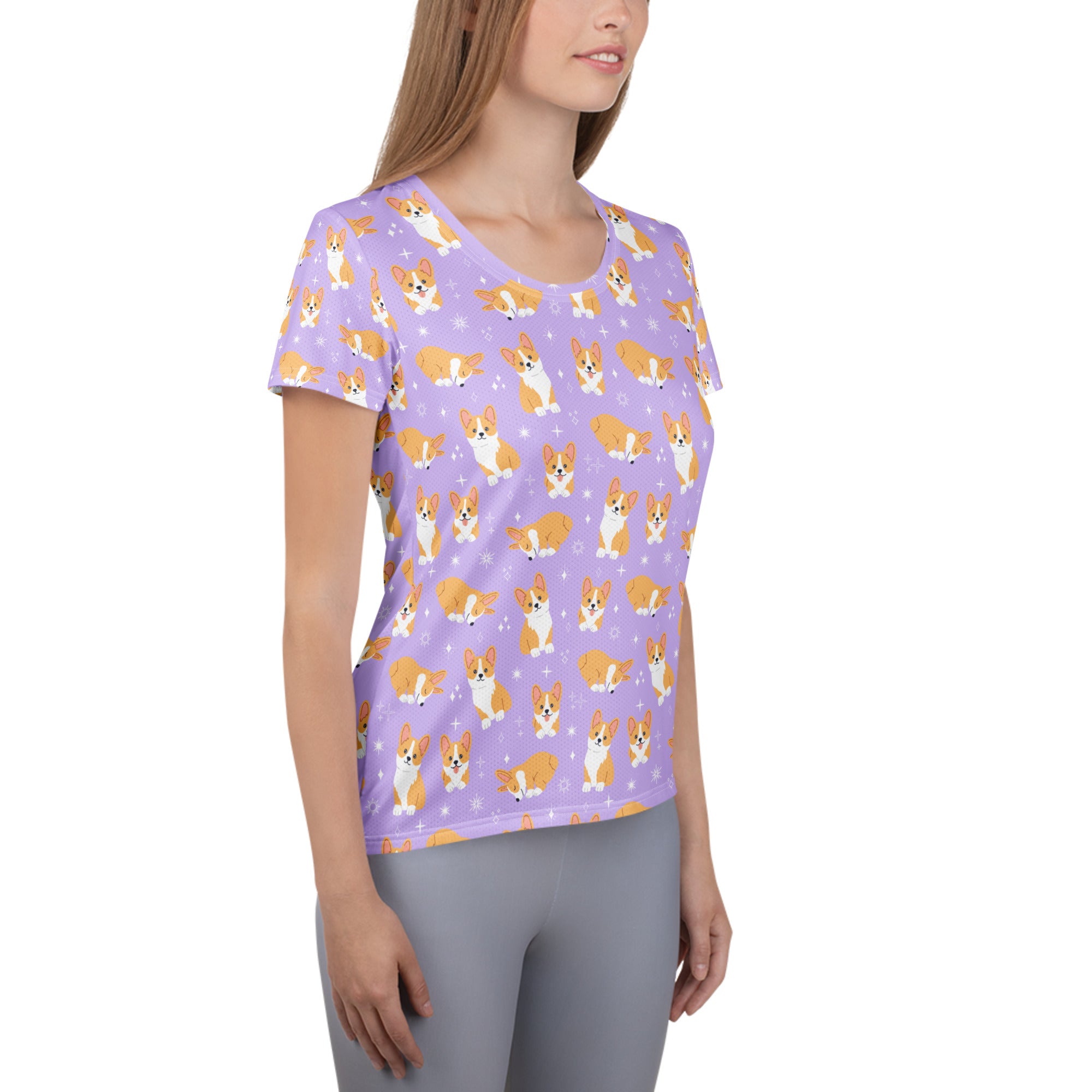 Women’s purple corgi dog performance athletic t-shirt with lightweight moisture wicking fabric and cartoon corgis pattern