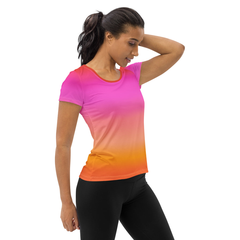 Women’s sunset ombre performance athletic t-shirt with pink to orange gradient in breathable moisture wicking fabric