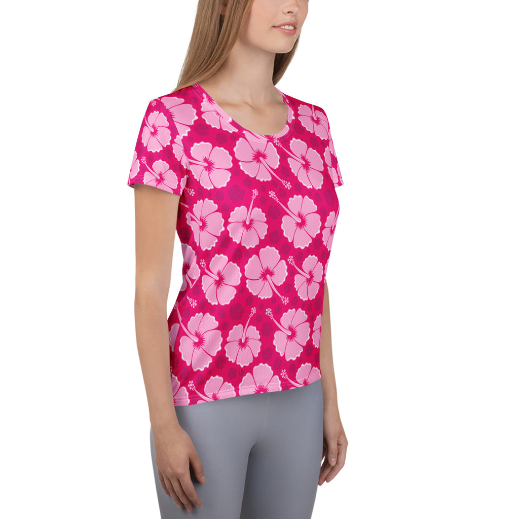 Women’s pink hibiscus performance athletic t-shirt with light pink flower pattern lightweight moisture wicking top