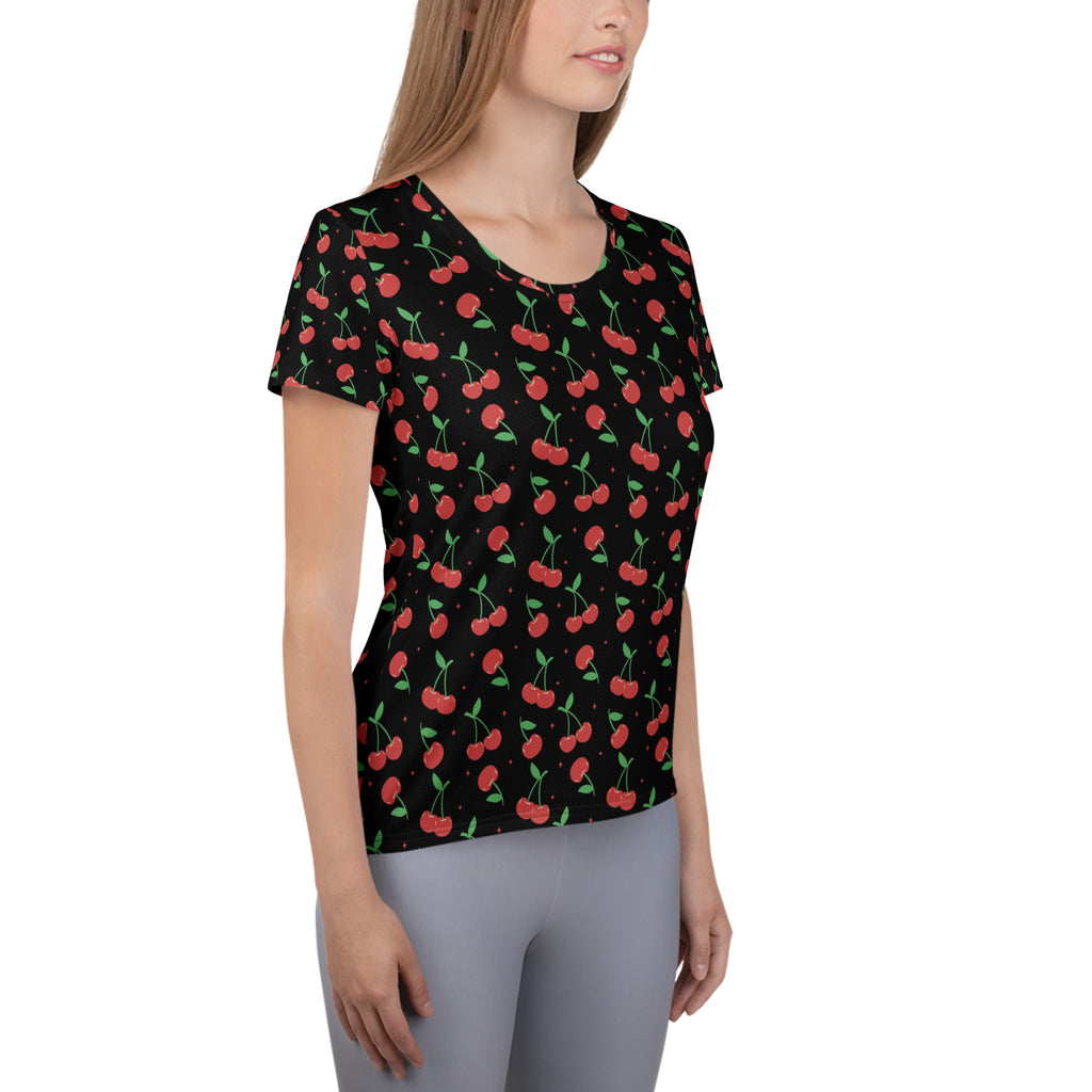 Black short-sleeved women’s cherry print performance athletic t-shirt with moisture wicking fabric and upf 50+ protection