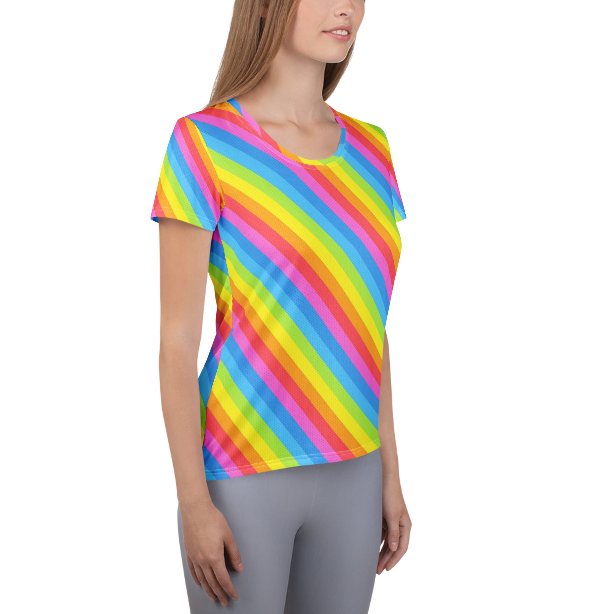 A vibrant women’s short-sleeved rainbow stripe performance athletic t-shirt with moisture wicking and UPF 50+ protection