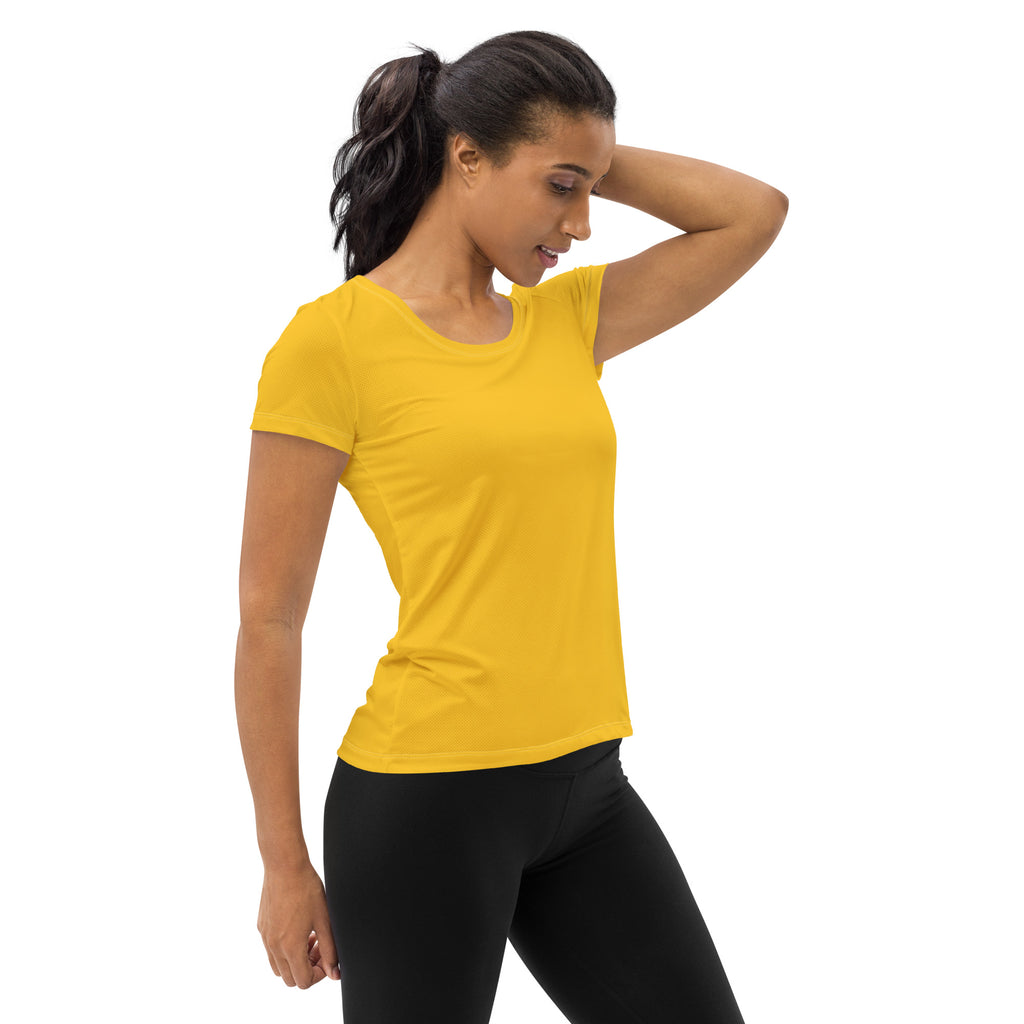A vibrant yellow women’s performance athletic t shirt with a round neckline lightweight moisture wicking fabric