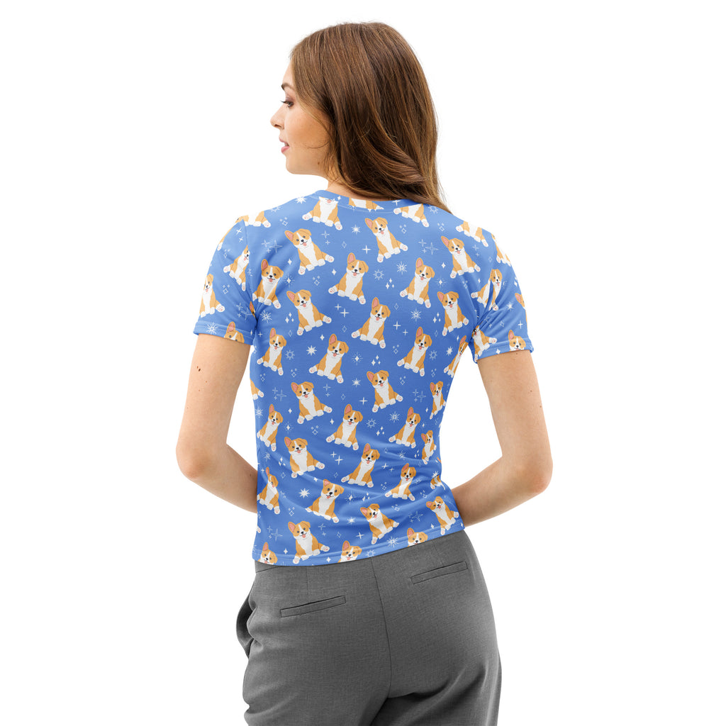 Women’s blue cotton t-shirt with soft stretch featuring a repeating cartoon corgi pattern and white sparkles