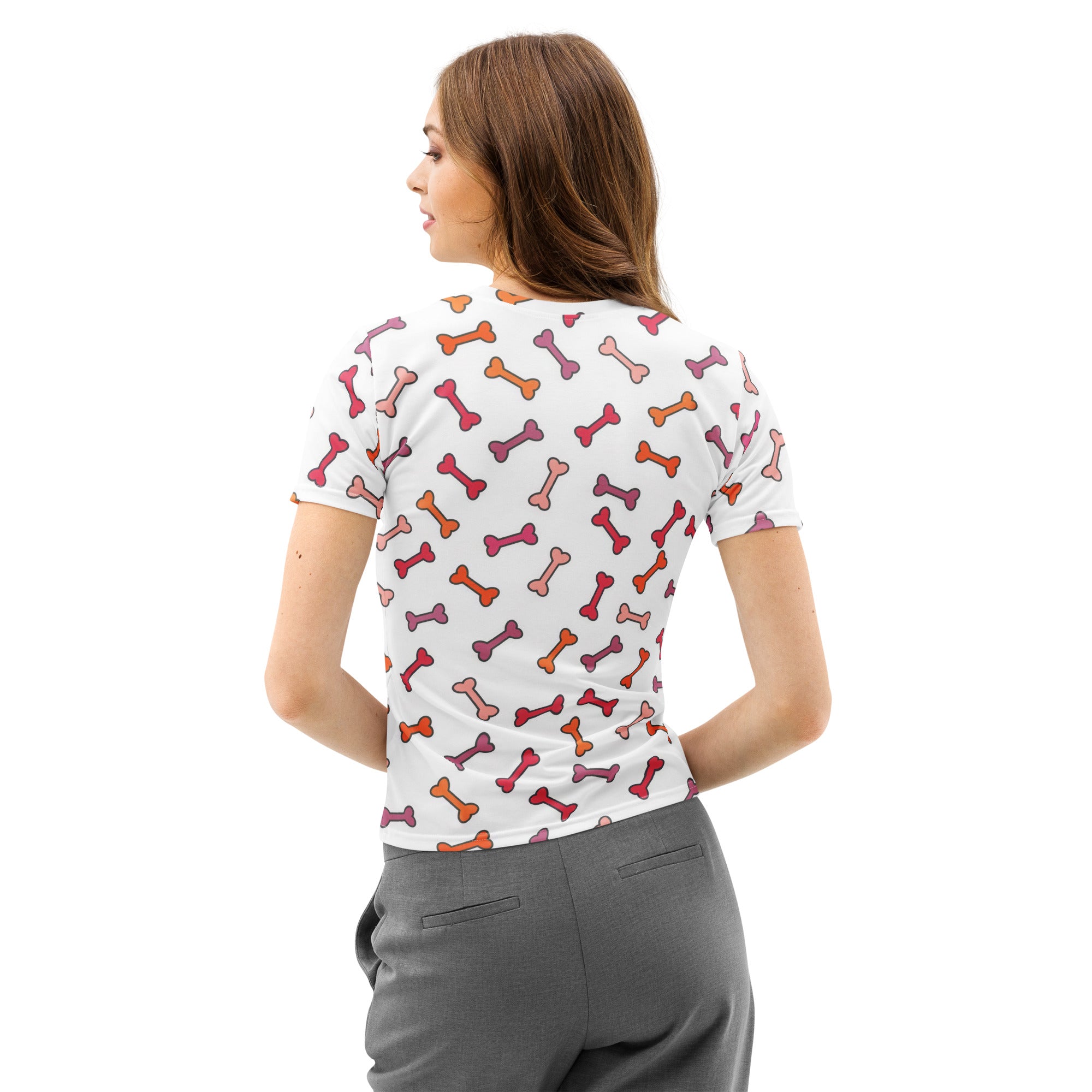 Women’s white cotton t-shirt with short sleeves featuring a colorful dog bone print in pink orange and red