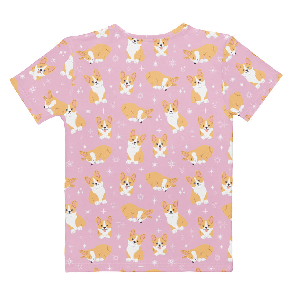 Women’s pink cotton t-shirt with short sleeves featuring playful tan and white corgi print and starburst accents