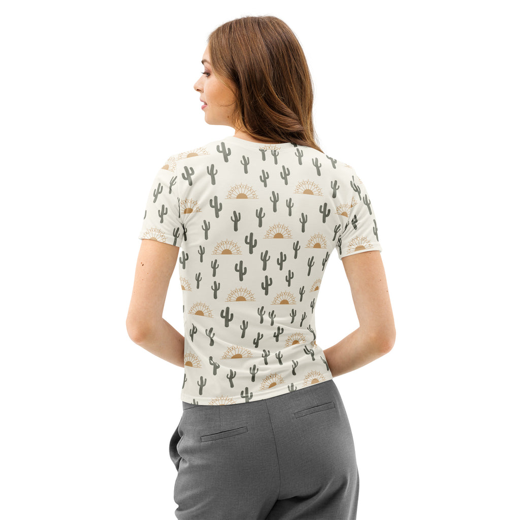 A cream cotton women’s cactus desert t-shirt with soft stretch featuring black cacti and gold sunburst patterns