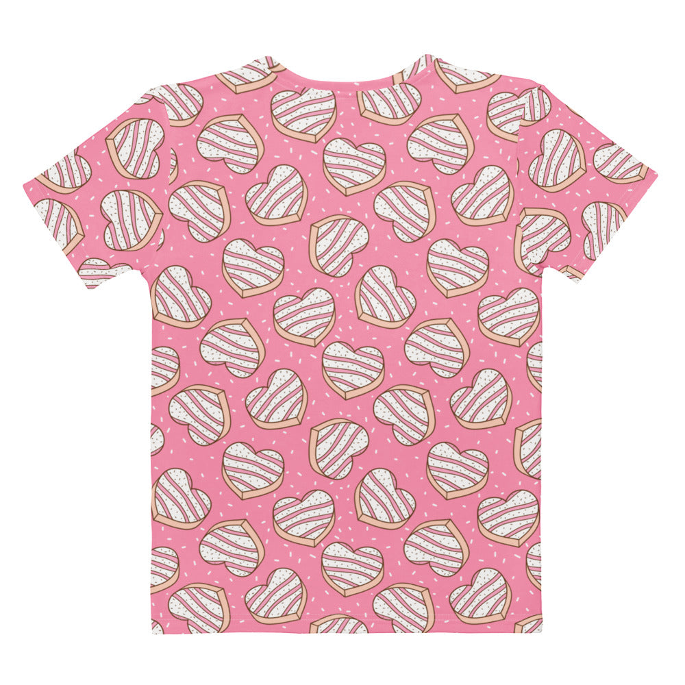 Women’s pink cotton t-shirt with soft stretch featuring heart-shaped cookies with pink icing and white sprinkles pattern
