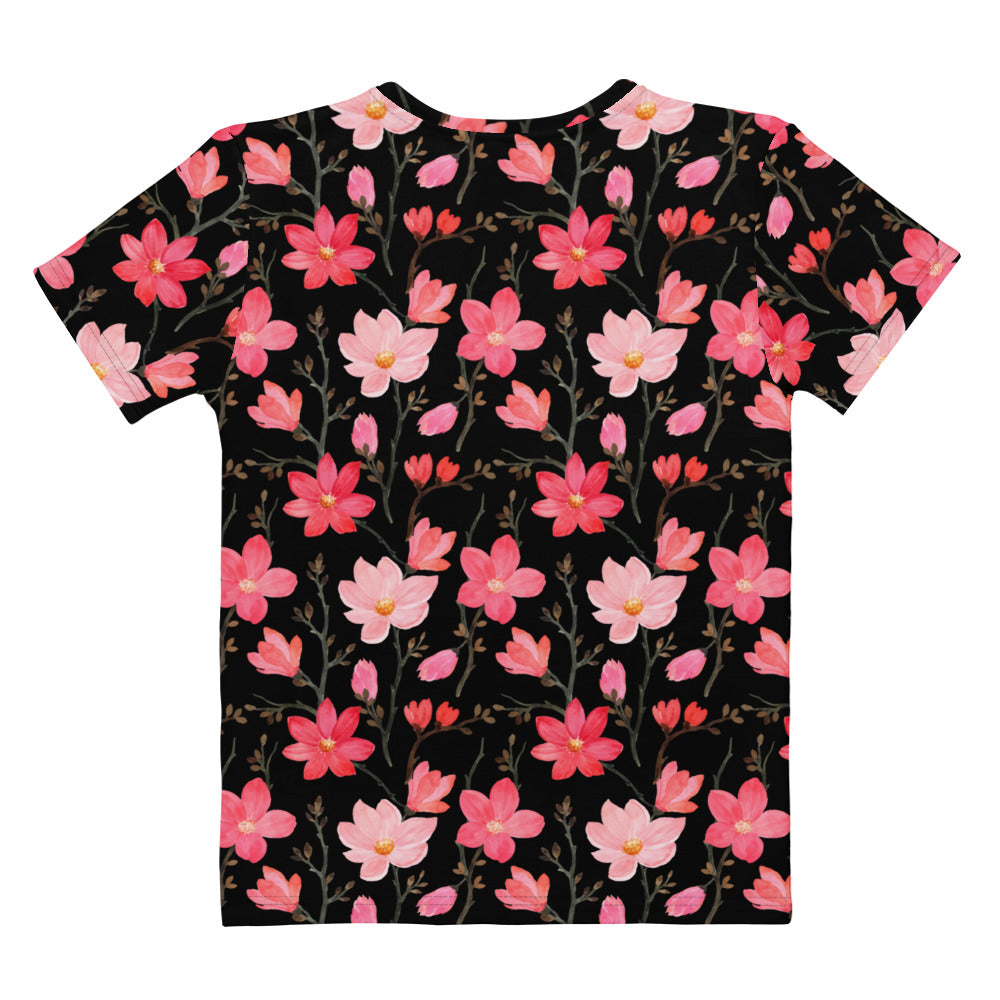 Women’s vibrant pink blossoms cotton t-shirt with short sleeves featuring a floral pattern on black background