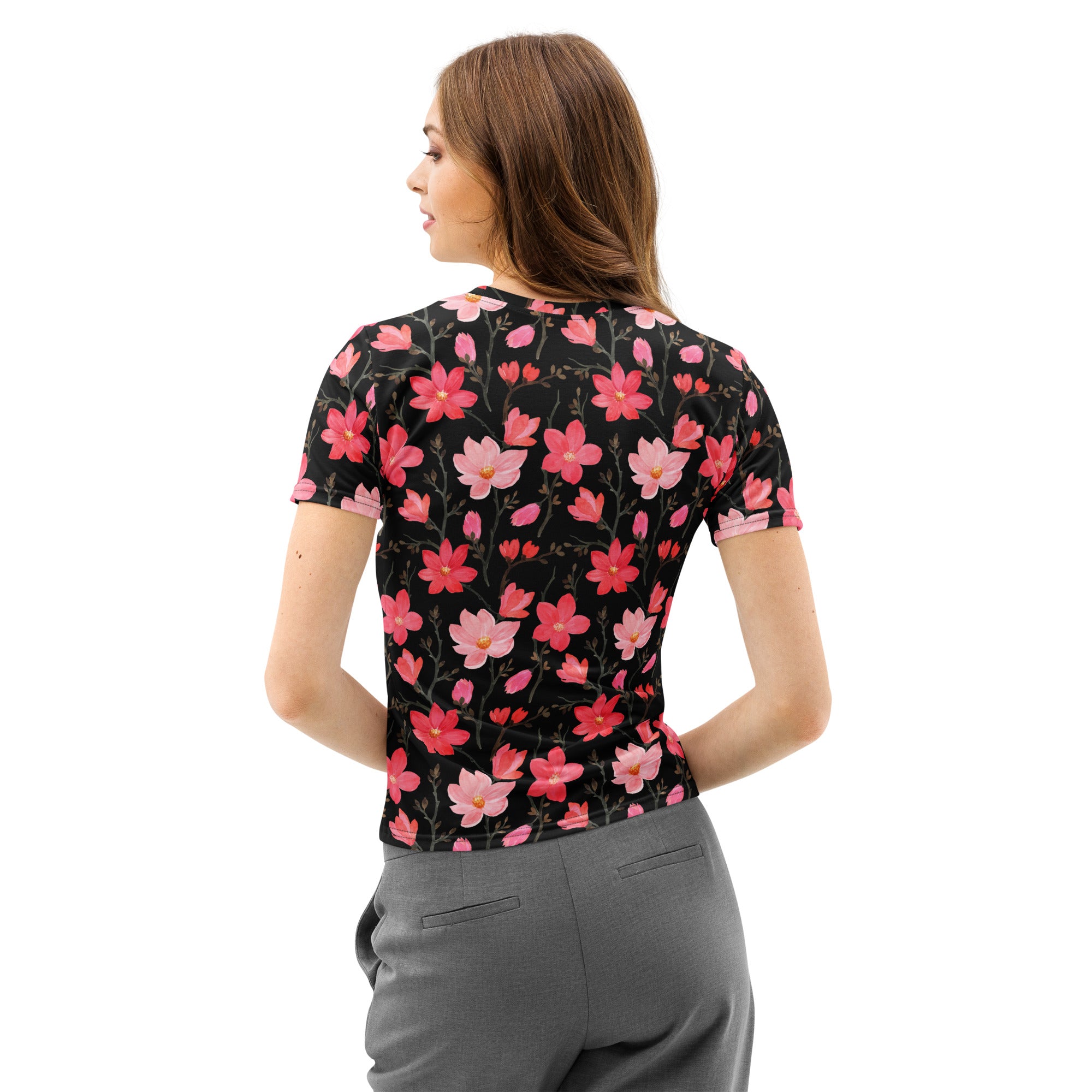 Women’s vibrant pink blossoms cotton t-shirt with black short sleeves and a pattern of pink red flowers and green stems