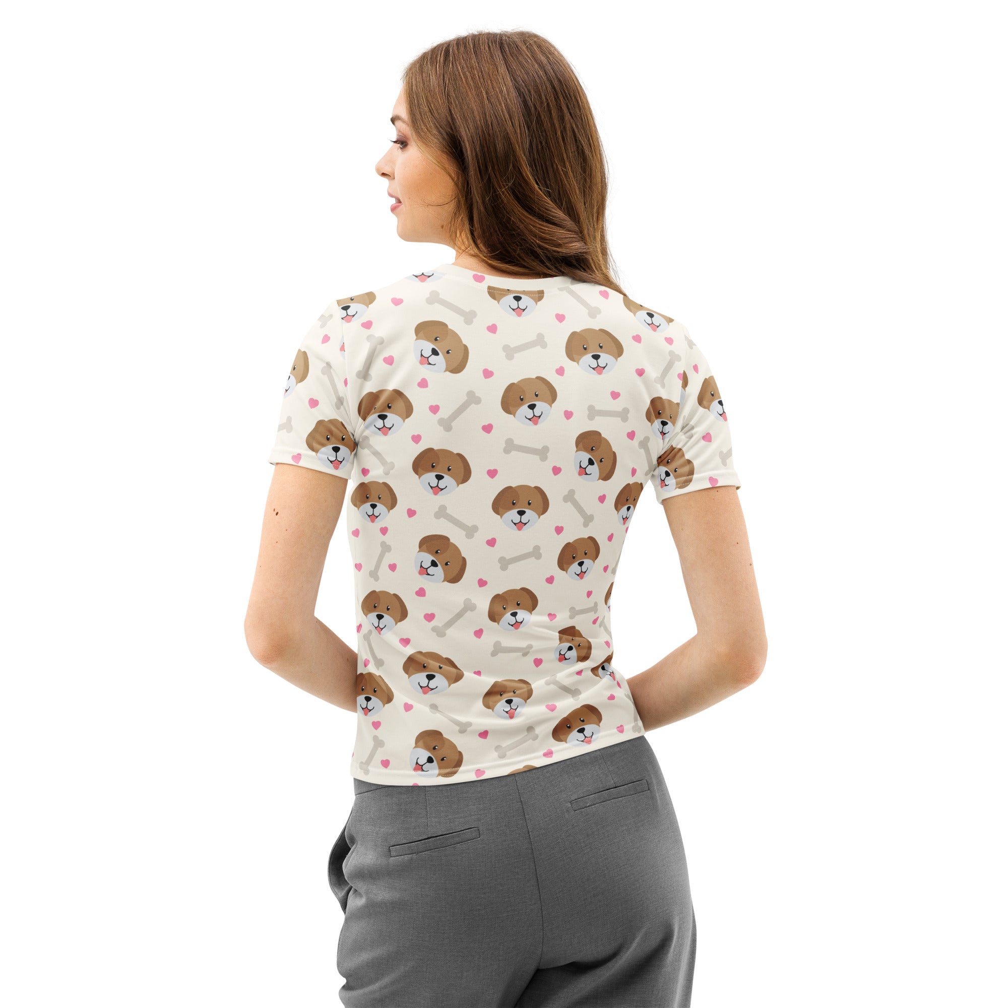 A cream-colored women’s short-sleeved cotton t-shirt with a cute puppy print featuring brown faces pink hearts and gray bones