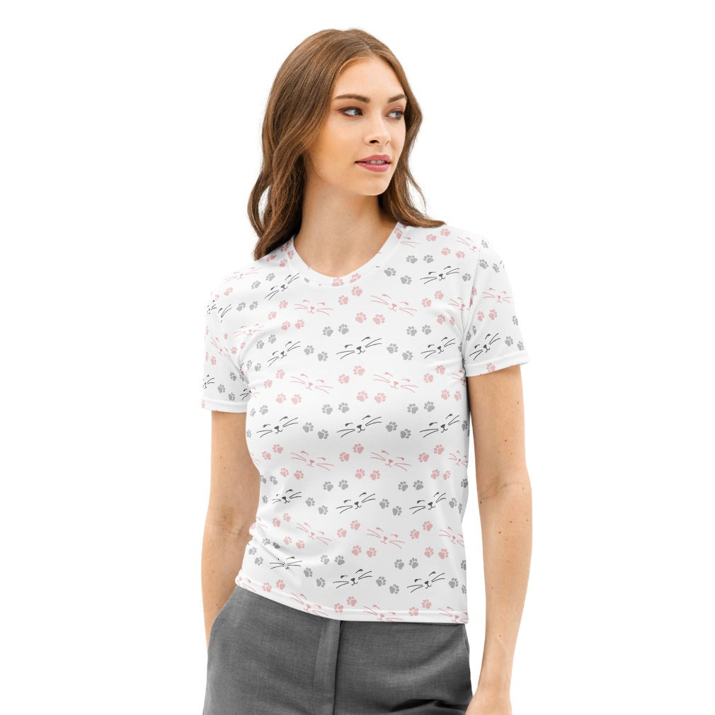 White cotton women’s t-shirt with short sleeves featuring a playful pink and gray cat face pattern with whiskers