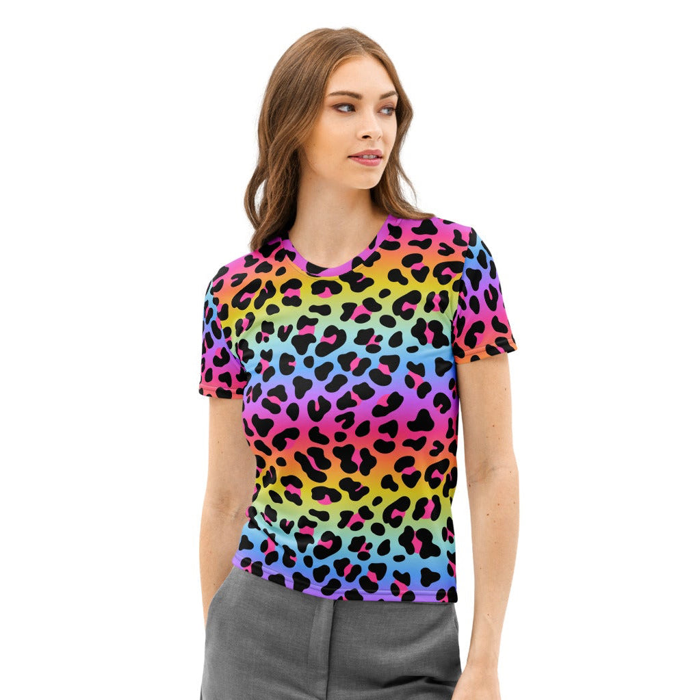 A vibrant rainbow-colored leopard print cotton t-shirt with black spots and a round neckline for women