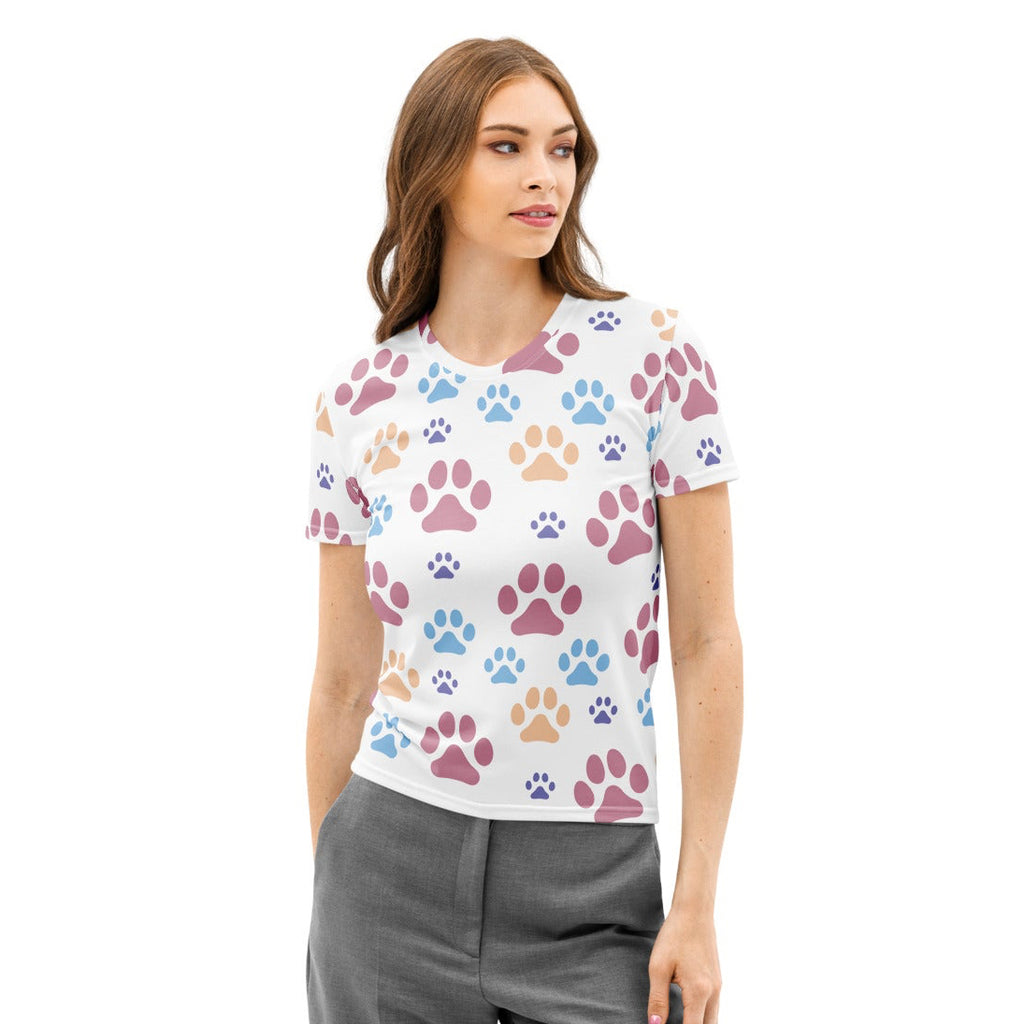 White women’s short-sleeved cotton t-shirt with soft stretch and multicolored pink blue beige paw print pattern