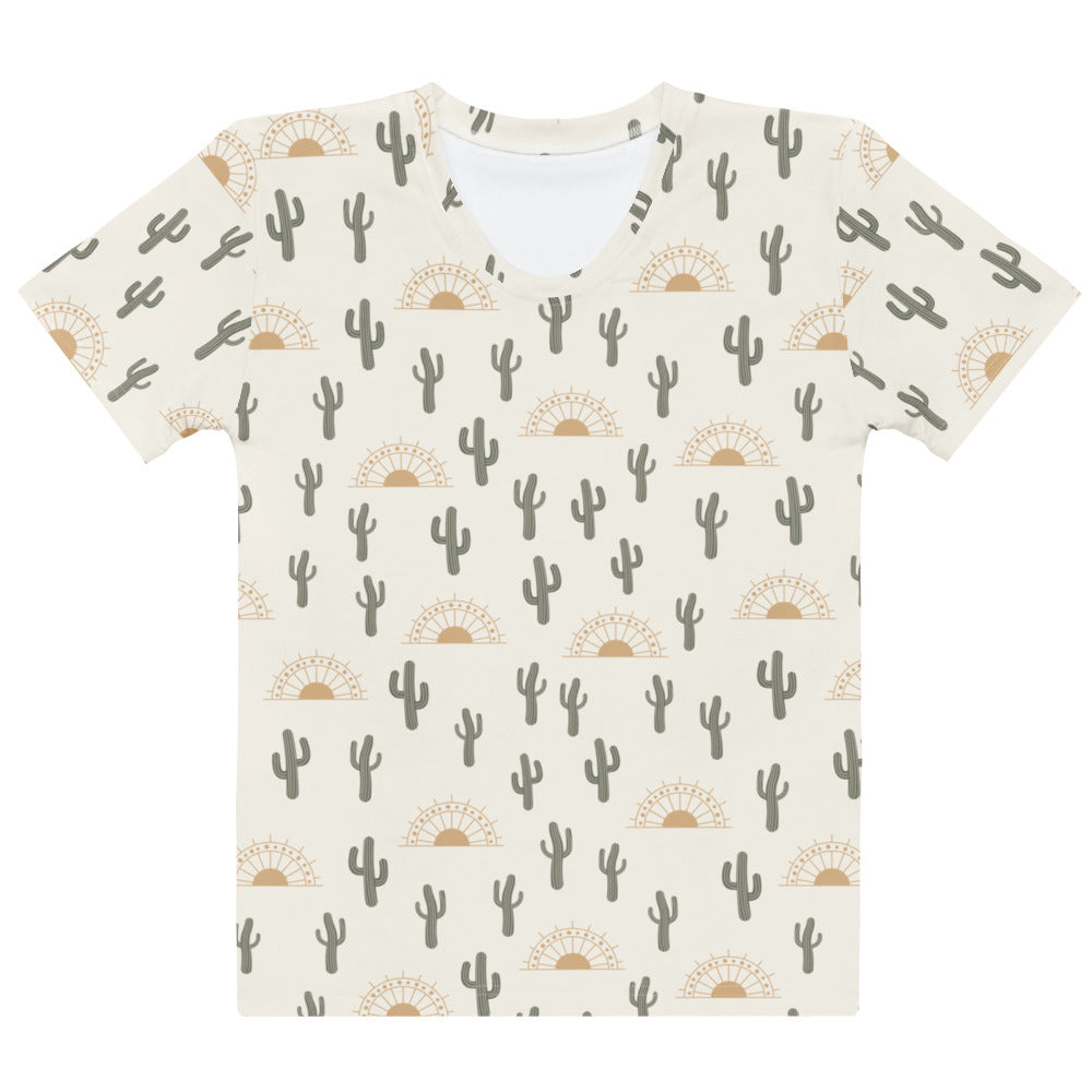 Cream-colored women’s cactus desert cotton t-shirt with soft stretch and pilling resistant fabric featuring gray cacti and tan sunburst pattern