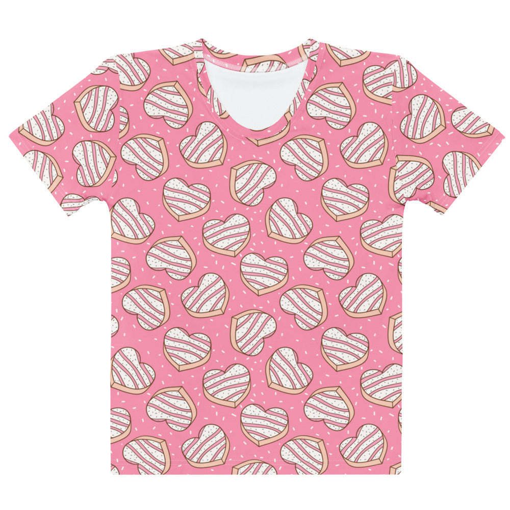 Women’s pink cotton t-shirt with soft stretch featuring a repeating pattern of heart-shaped cookies with icing stripes