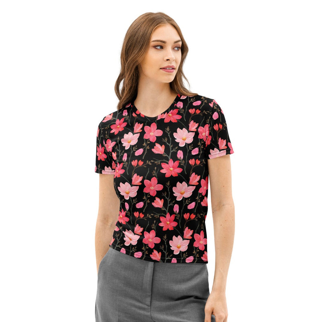 Black short-sleeved cotton t-shirt with vibrant pink and light pink blossoms soft stretch pilling resistant tee