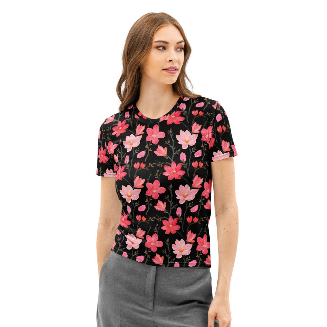 Black short-sleeved cotton t-shirt with vibrant pink and light pink blossoms soft stretch pilling resistant tee