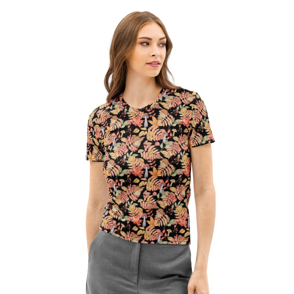 Women’s black cotton short-sleeved t-shirt with vibrant autumn leaf pattern in orange pink and green soft stretch fabric