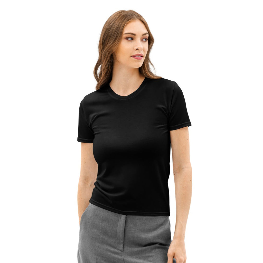 Woman wearing a black t-shirt and gray pants on a white background