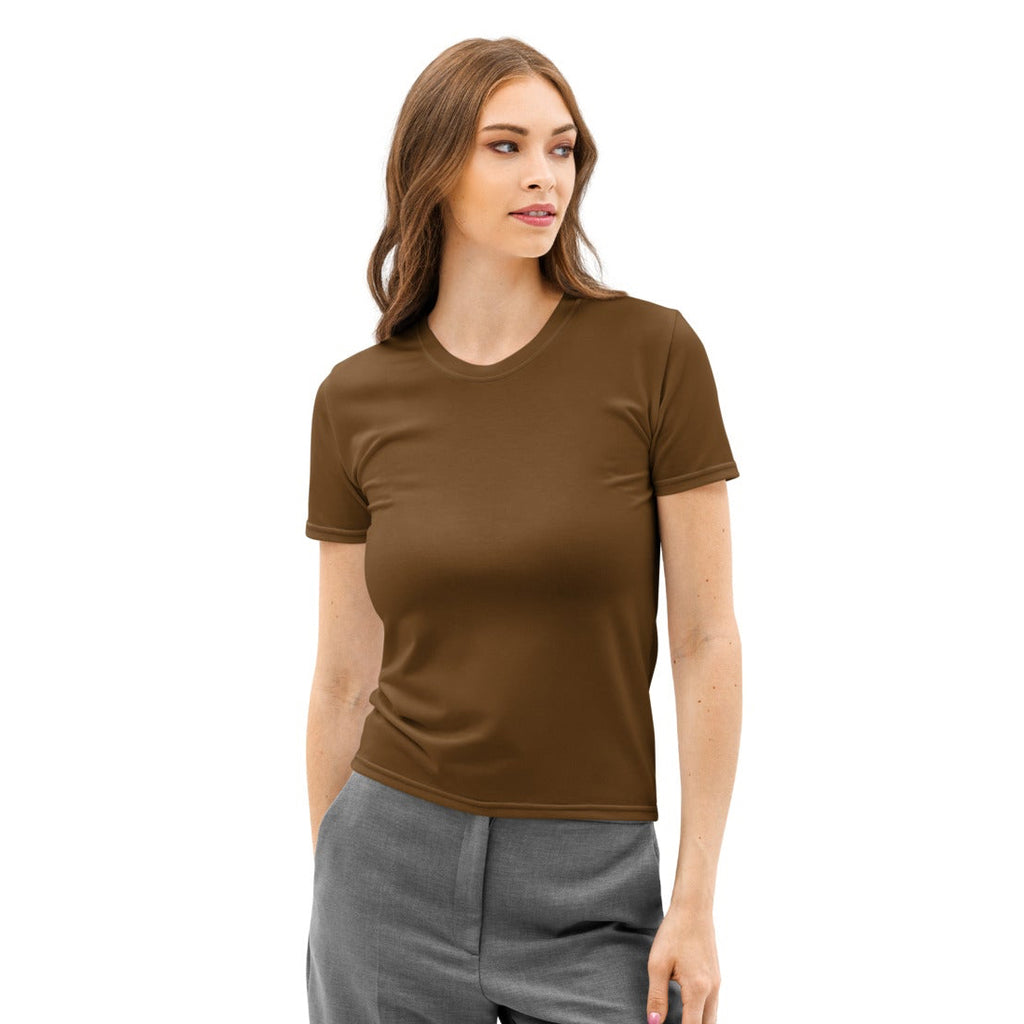 Woman wearing a brown t-shirt and gray pants on a white background