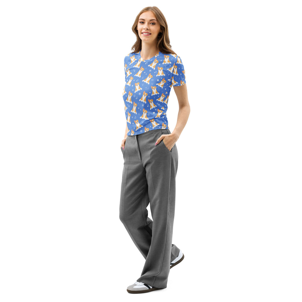 Women’s blue cotton t-shirt with soft stretch featuring a light brown and white corgi dog pattern on starry background