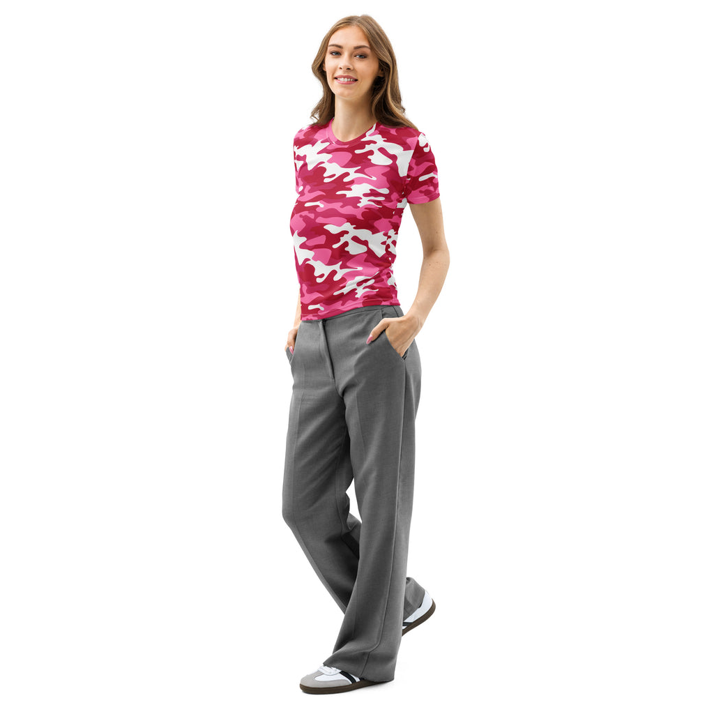 A woman wearing a women’s bright pink cotton t-shirt with soft stretch and pilling resistant fabric paired with gray trousers