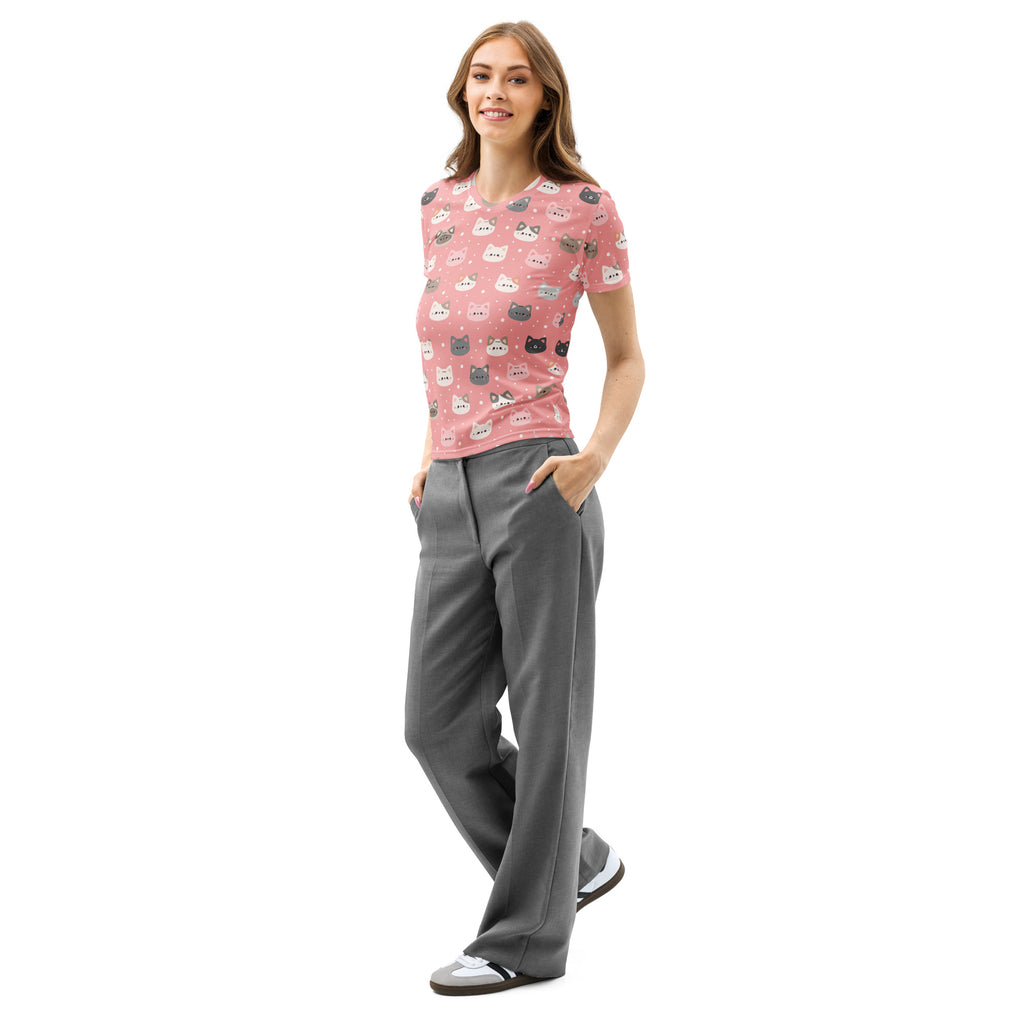 Women’s cute pink cotton t-shirt with short sleeves and a playful colorful cartoon cat faces pattern