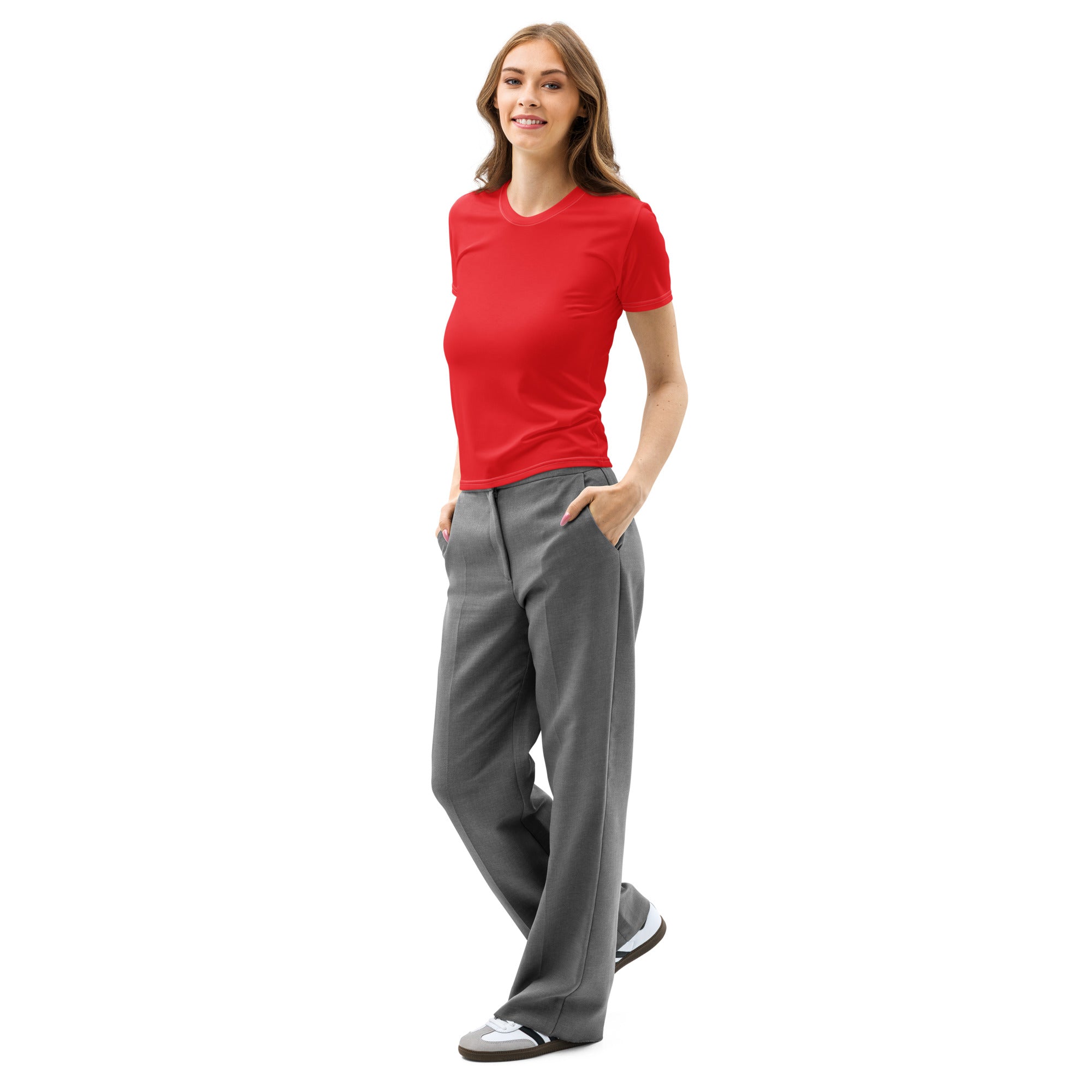 A woman wears a women’s red cotton t-shirt with soft stretch and pilling resistant fabric paired with gray trousers