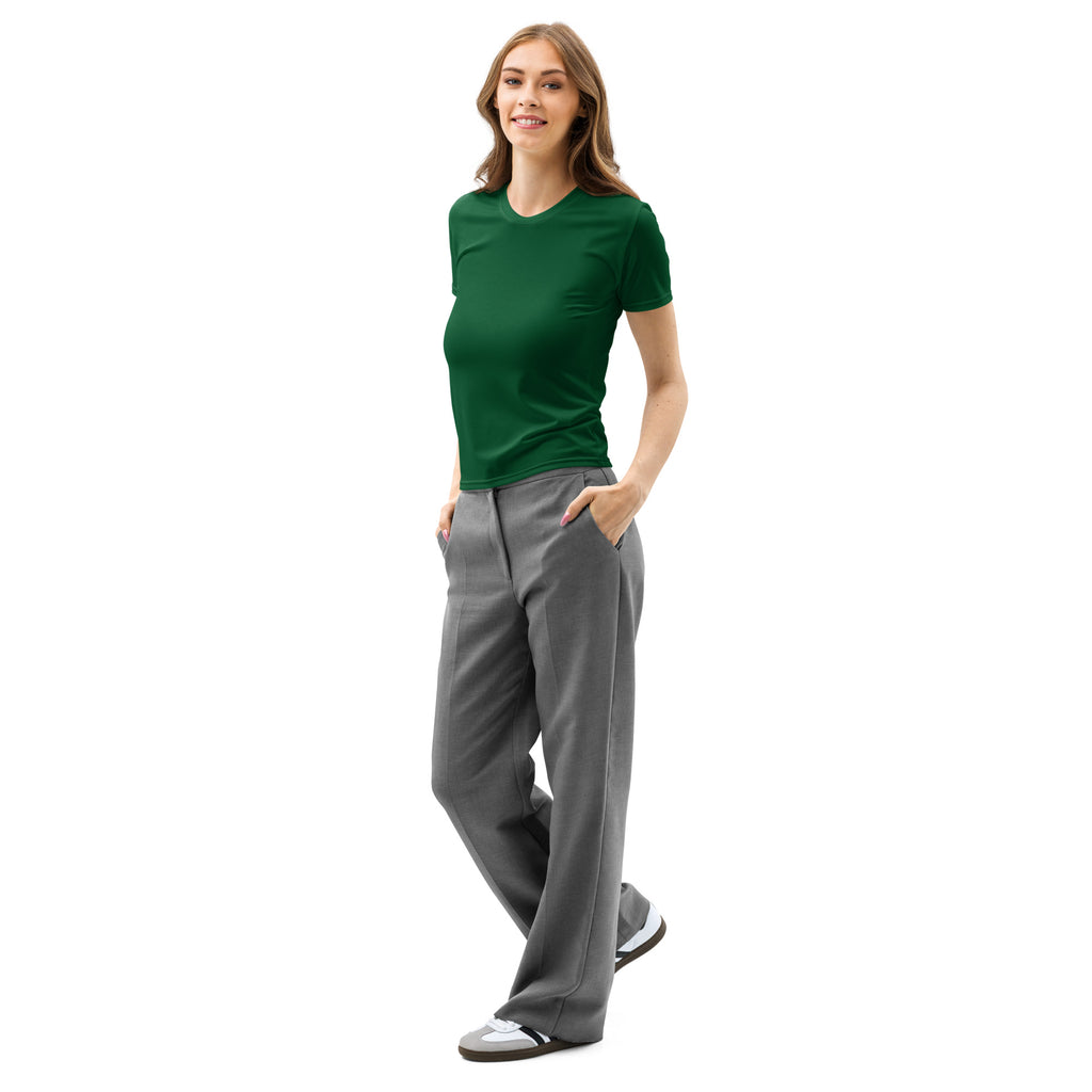 A woman wears a women’s dark green cotton t-shirt with soft stretch and pilling resistant fabric paired with gray trousers