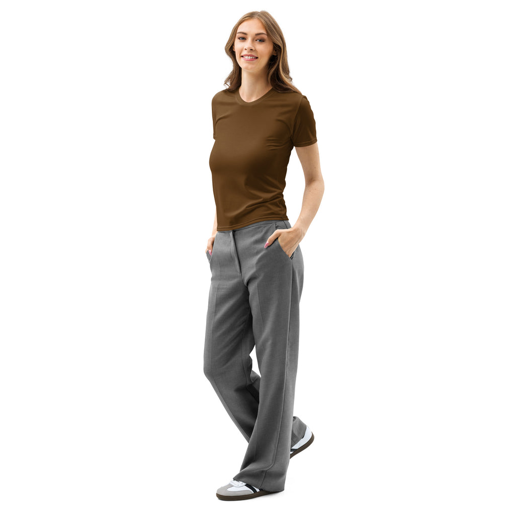 A woman wearing a women’s brown cotton t-shirt with soft stretch and pilling resistant fabric paired with gray trousers
