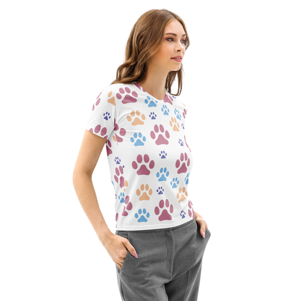 White short-sleeved cotton t-shirt with colorful pink blue and tan paw prints soft stretch pilling resistant tee for women