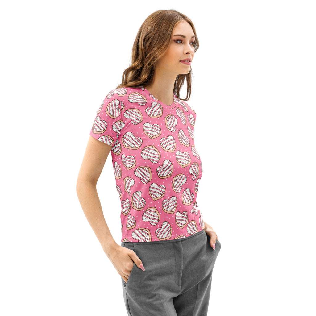 Women’s pink cotton t-shirt with short sleeves featuring playful hearts with striped interiors and subtle polka dots