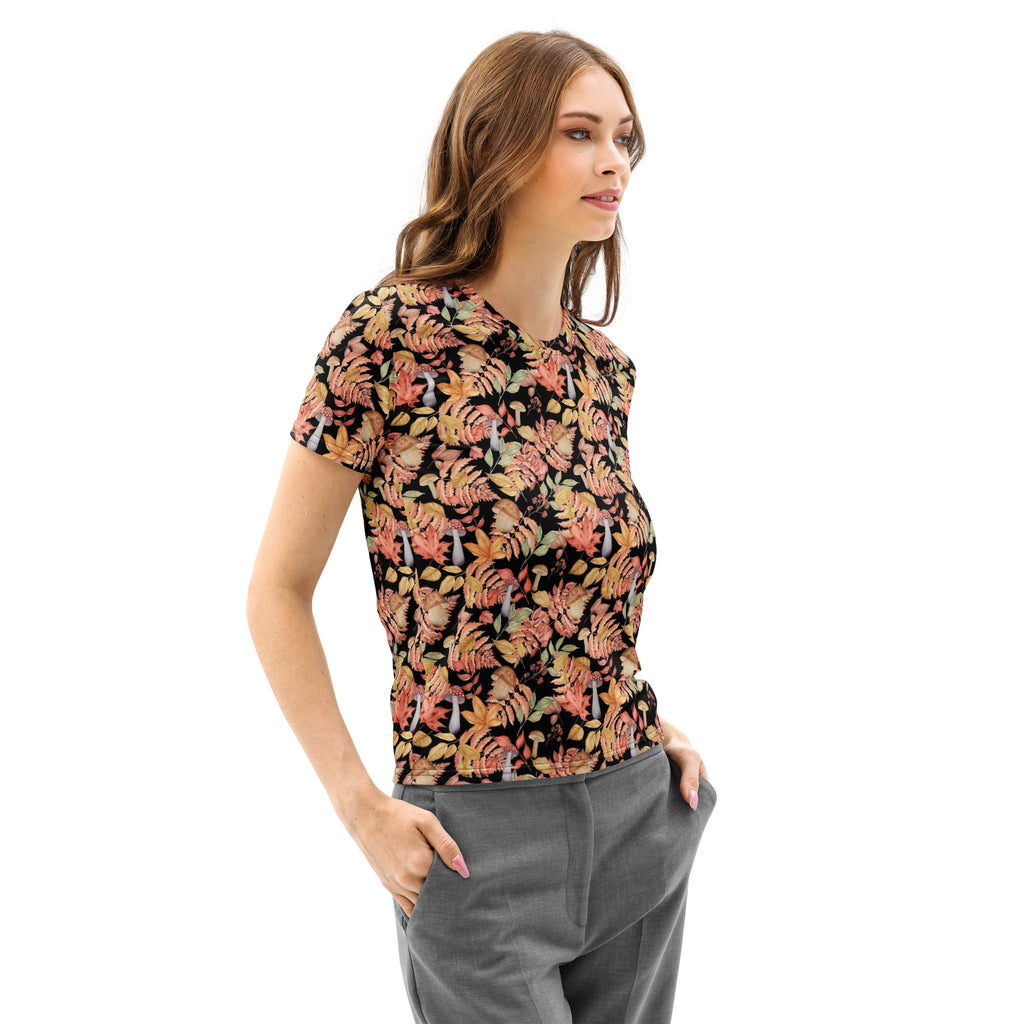 Women’s autumn botanical mushroom print cotton t-shirt with soft stretch black base and vibrant tropical leaf pattern