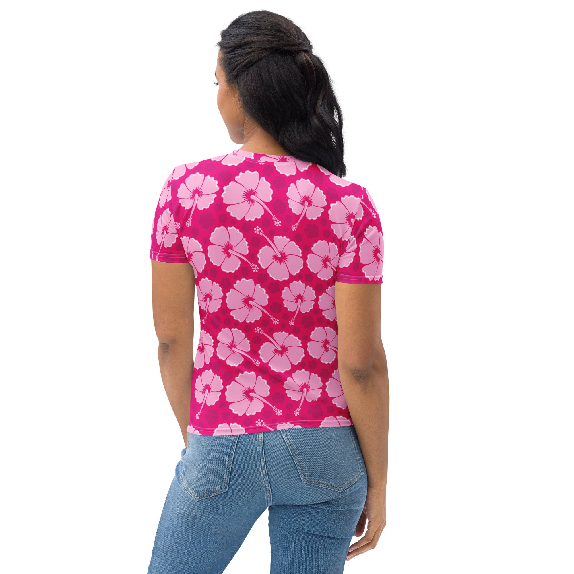 Women’s pink hibiscus floral t-shirt featuring vibrant pink short sleeves and soft stretch jersey fabric