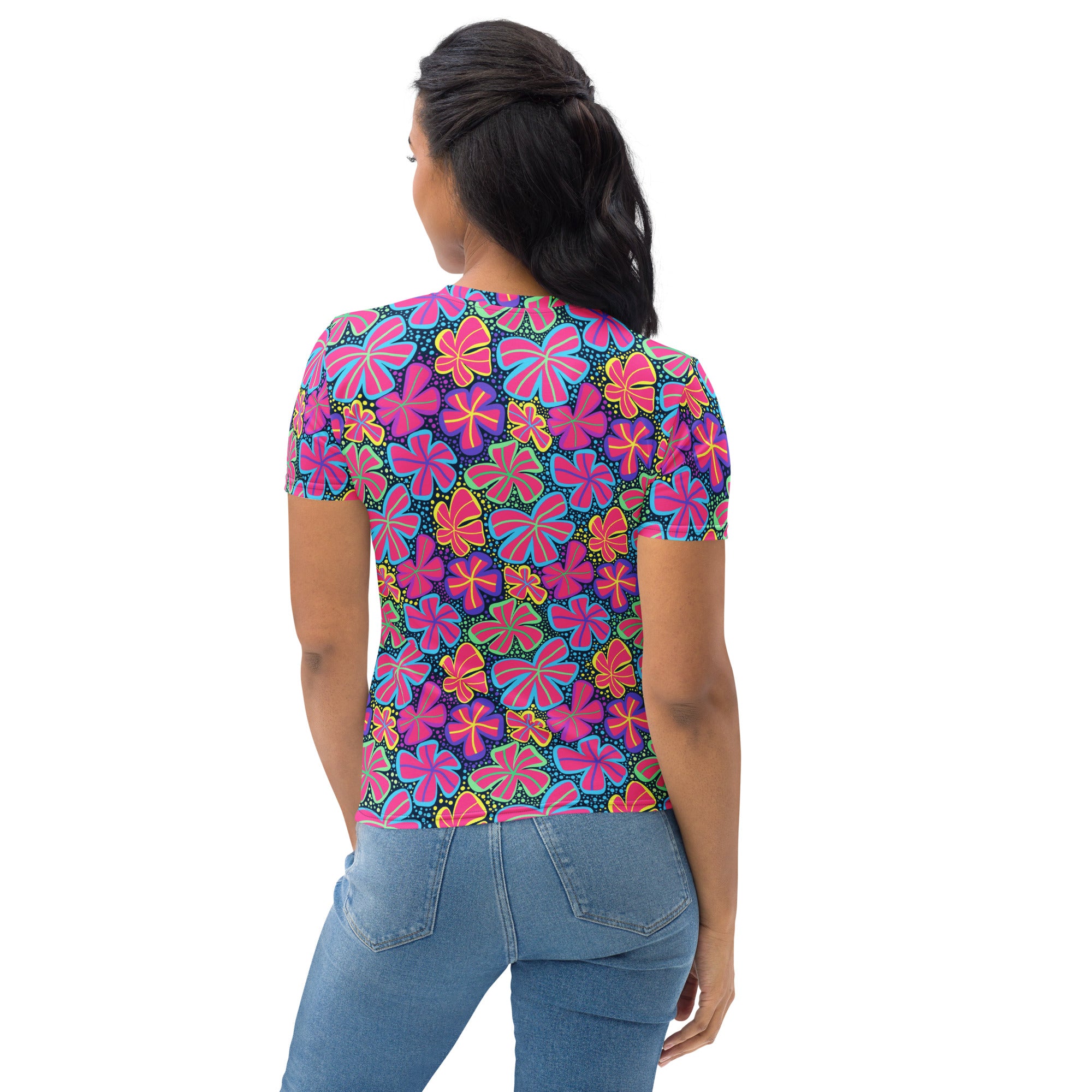 Women’s neon retro flower t-shirt with vibrant pink purple yellow floral pattern on dark navy soft stretch jersey