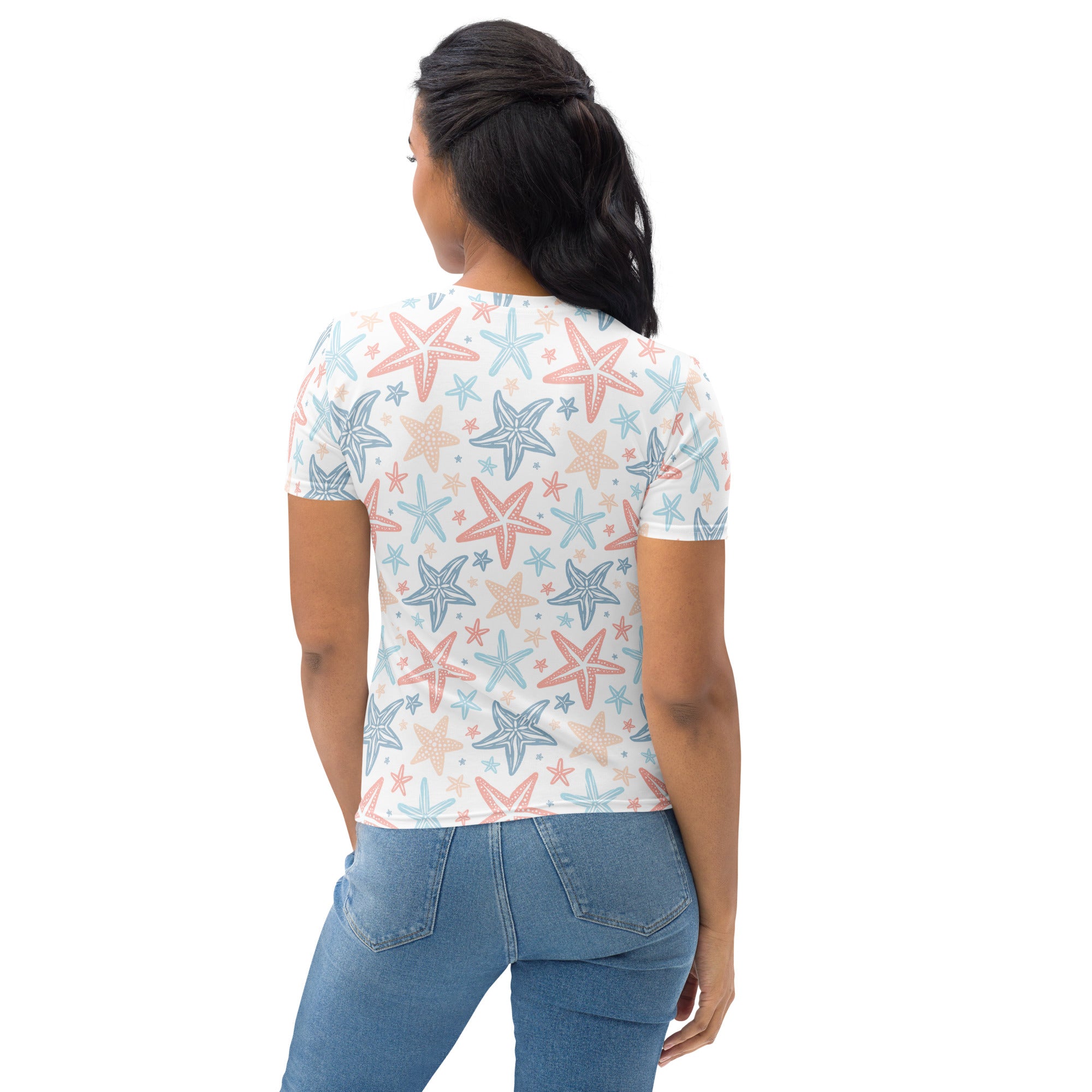 A white short-sleeved crop top in soft stretch jersey with a starfish print in coral light blue and pale peach hues
