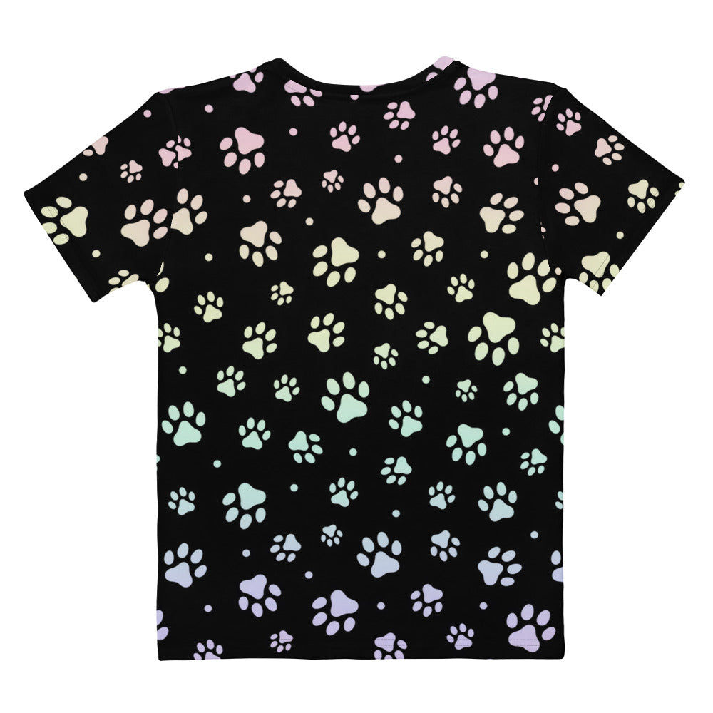 Black women’s short-sleeved t-shirt with pastel rainbow paw print pattern made from soft stretch jersey fabric