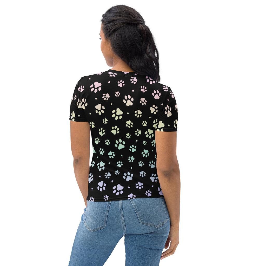 Black women’s short-sleeved t-shirt with multicolored pastel paw prints made from soft stretch jersey fabric