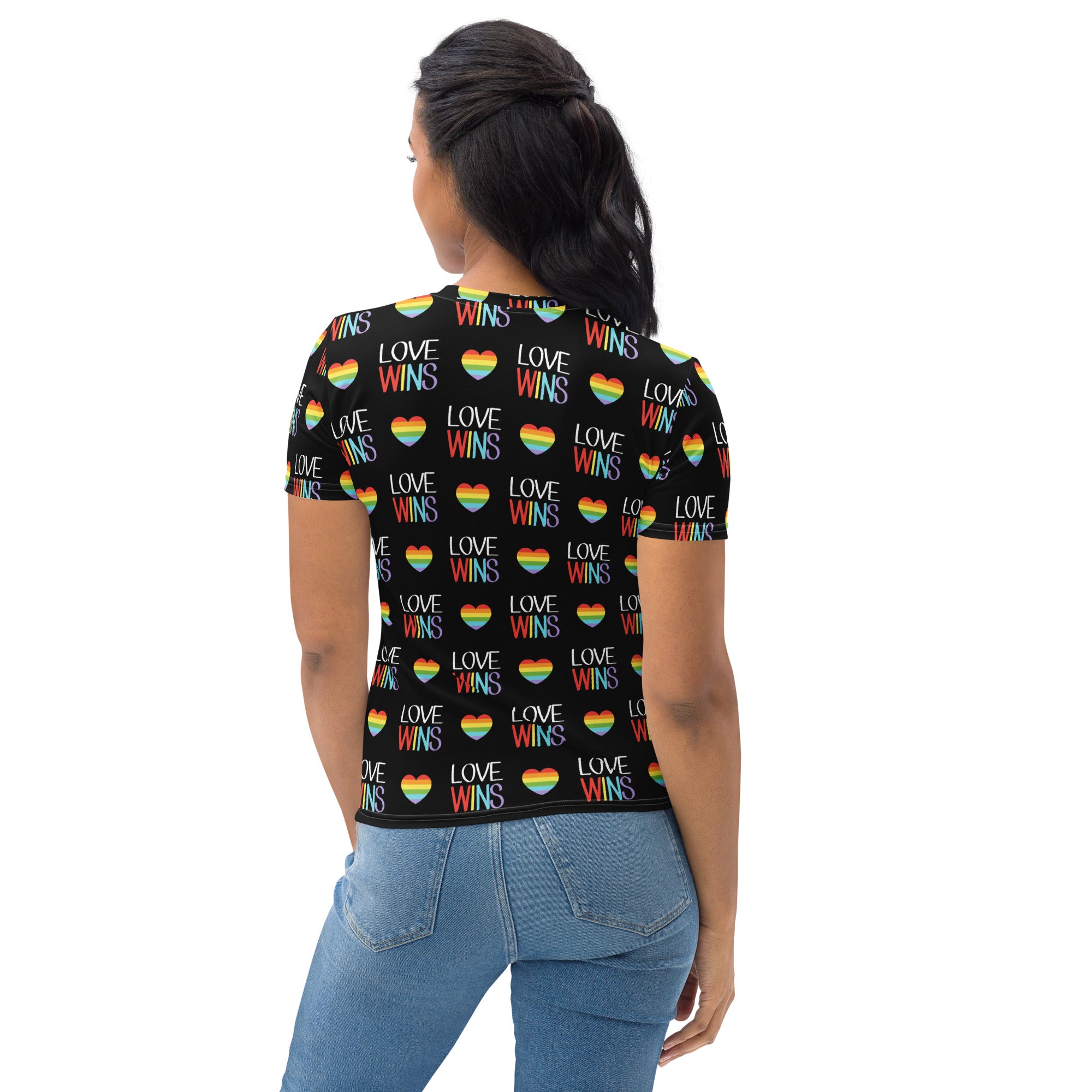 Black women’s love wins pride t-shirt with repeating rainbow hearts and text made from soft stretch jersey fabric