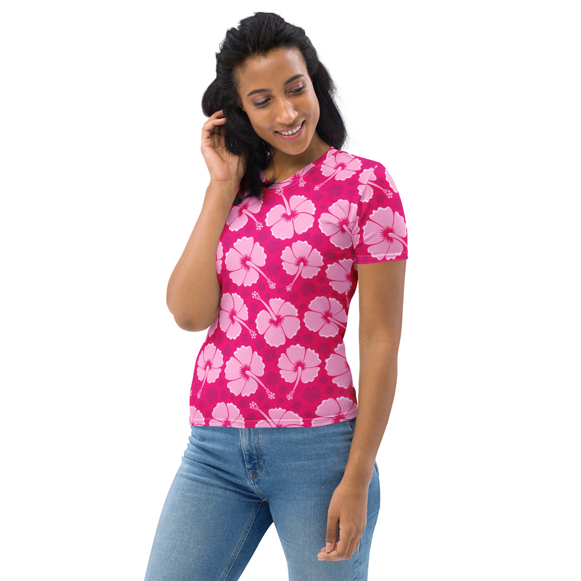 A vibrant pink women’s short-sleeved t-shirt with light pink hibiscus floral pattern in soft stretch jersey